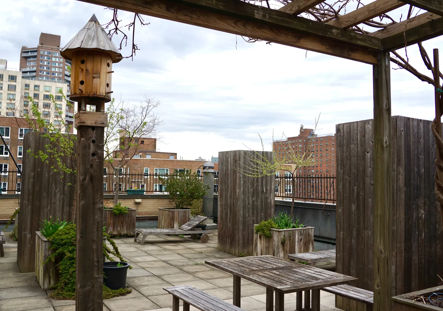 a view of a balcony with furniture