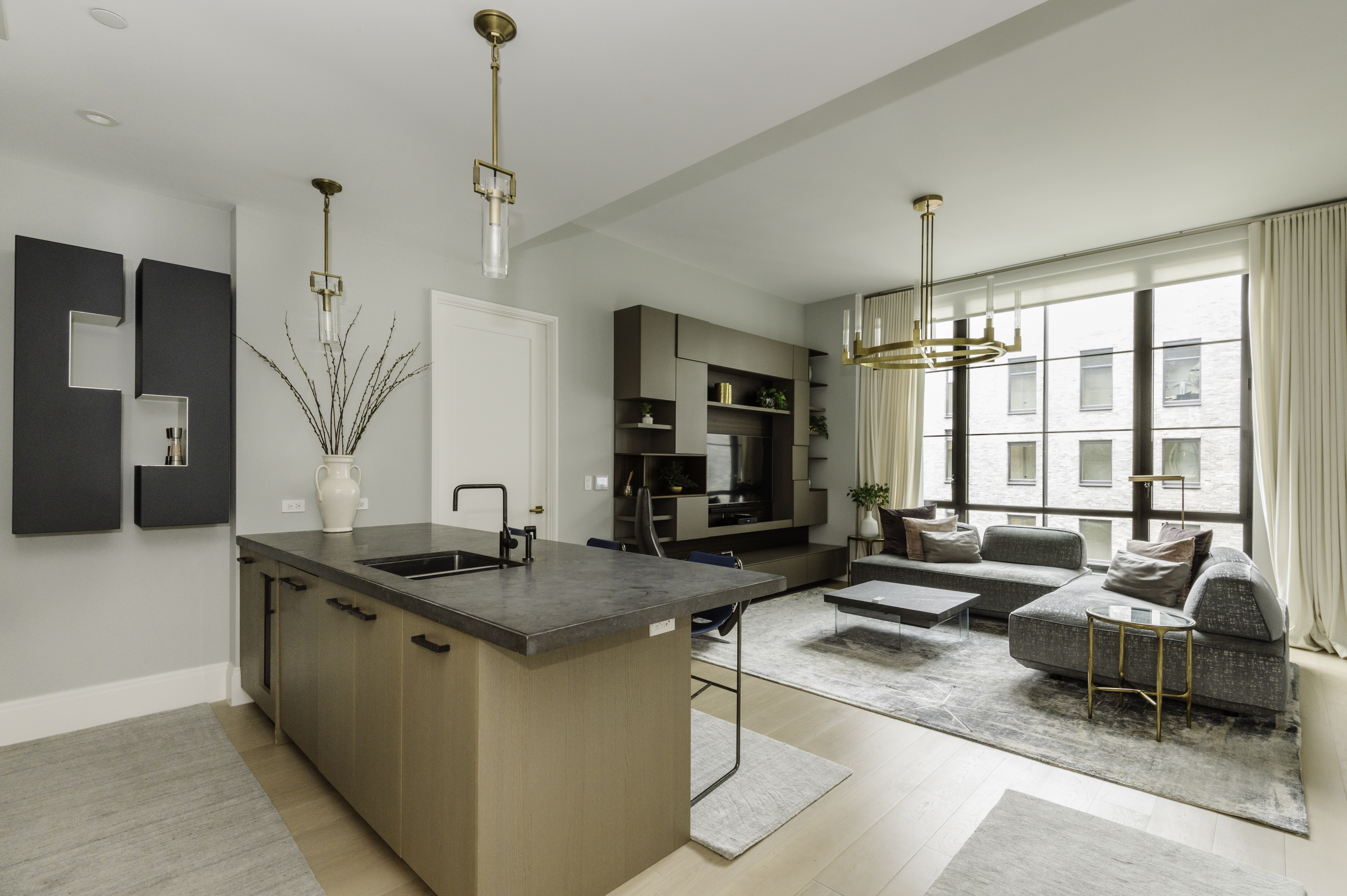438 East 12th Street, Unit 6J Manhattan, NY 10009 - Photo 2 of 14 a living room with furniture and a large window