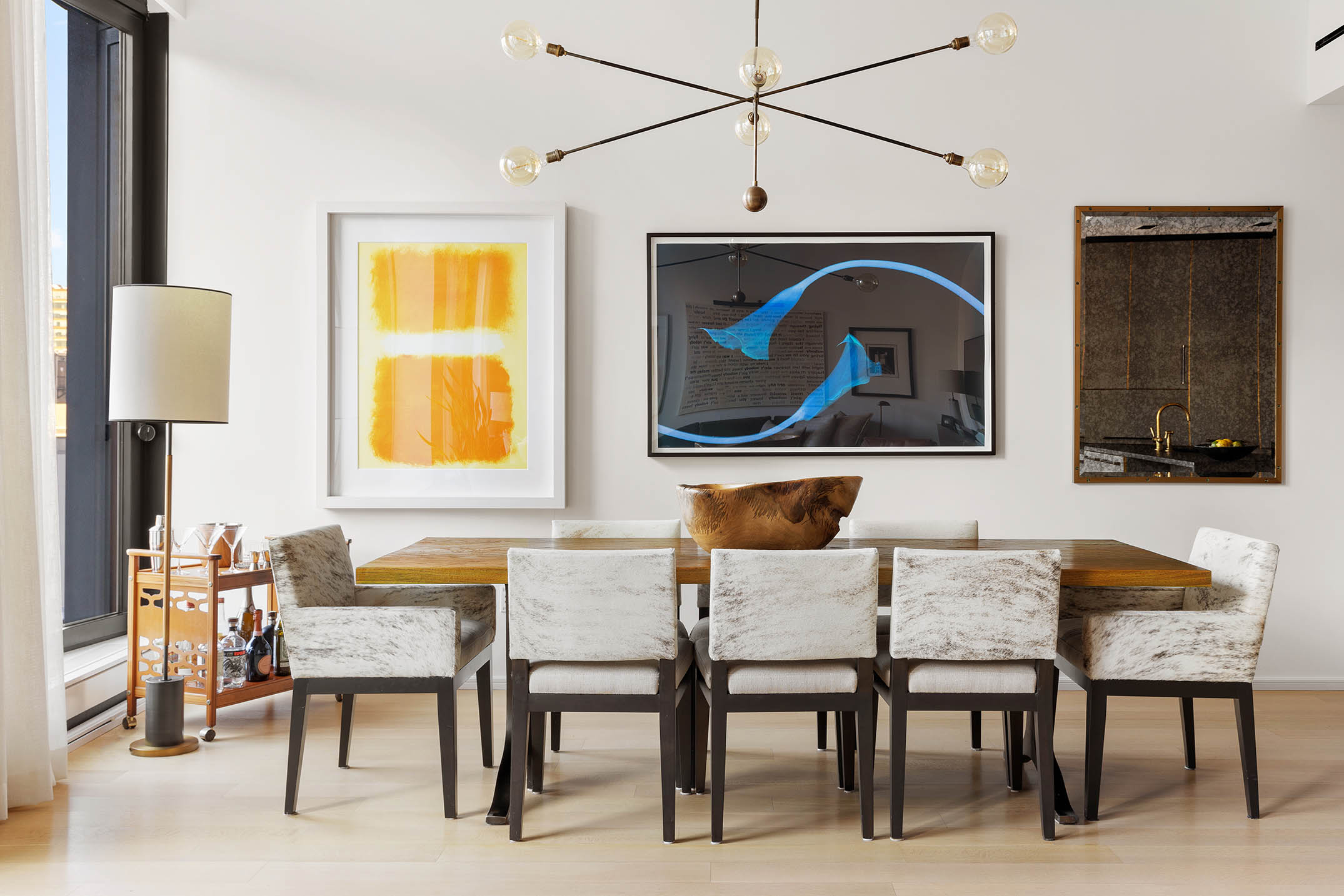 505 West 19th Street, Unit 8C Manhattan, NY 10011 - Photo 2 of 13 a dining room with furniture and window