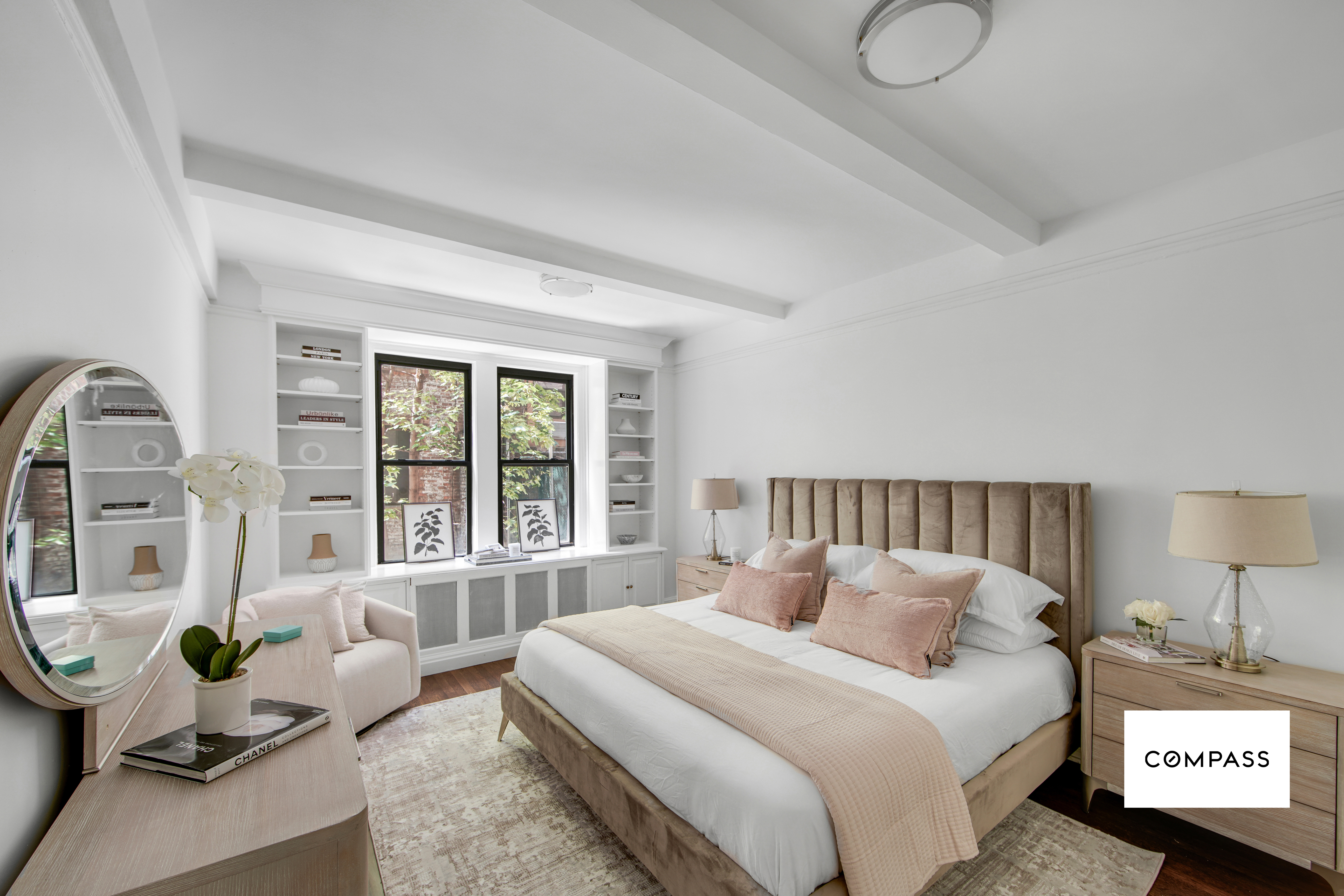 124 East 84th Street, Unit 1D Manhattan, NY 10028 - Photo 5 of 14 a bedroom with bed couch and window