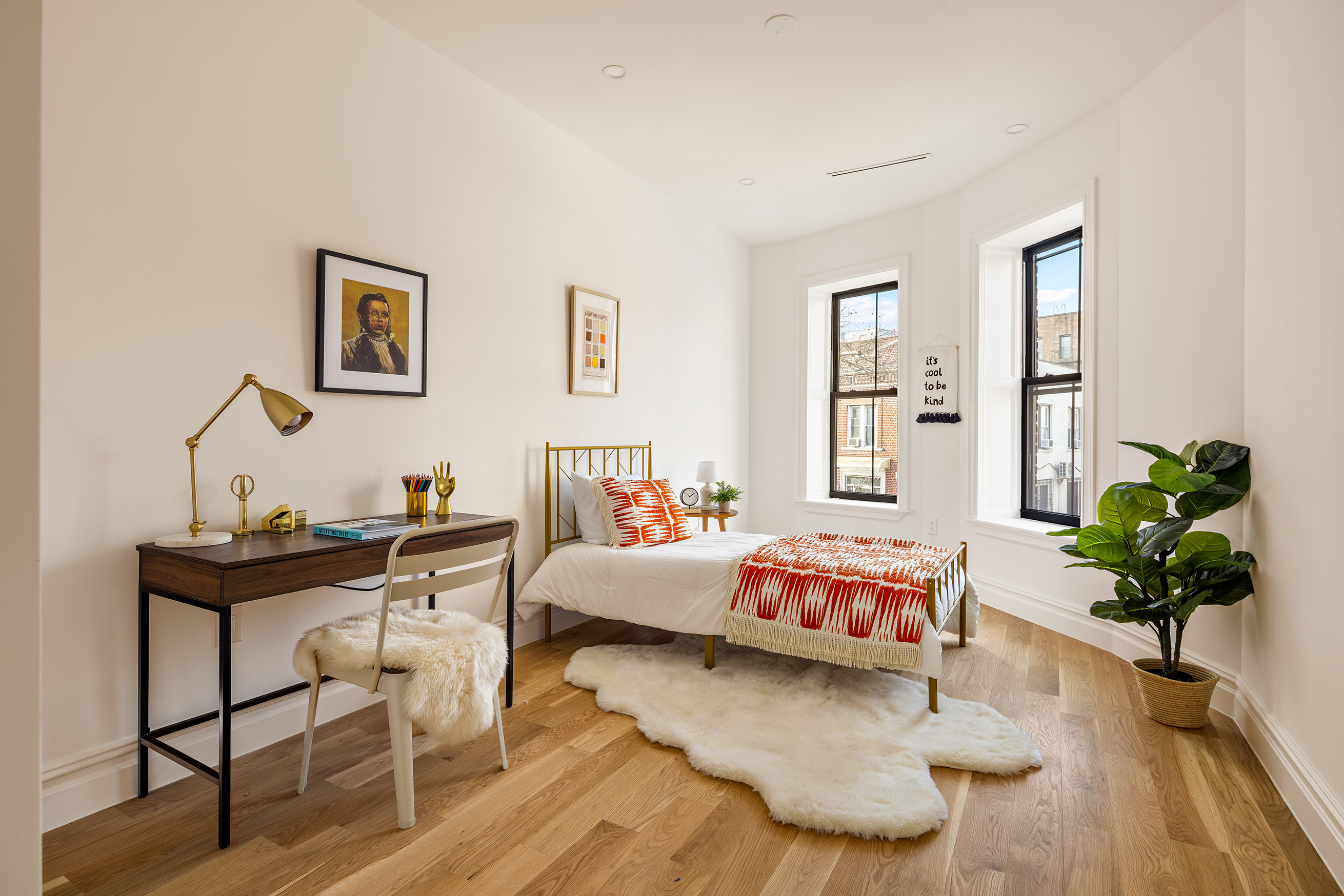 243 East 7th Street Brooklyn, NY 11218 - Photo 13 of 19 a living room with furniture and wooden floor