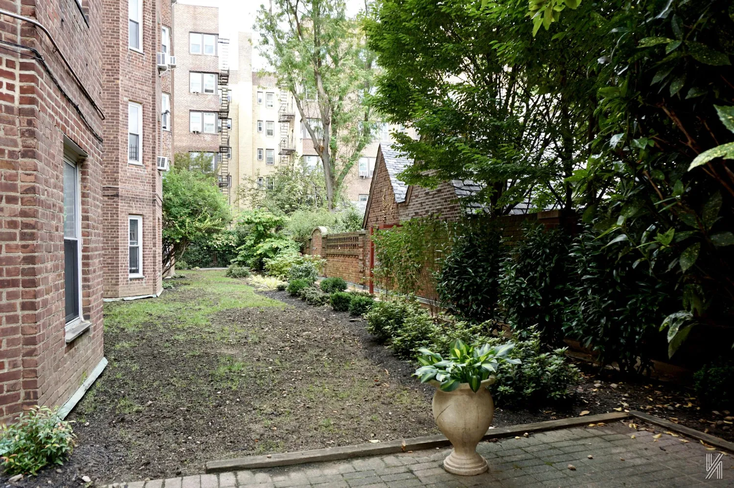 a view of a garden with potted plants