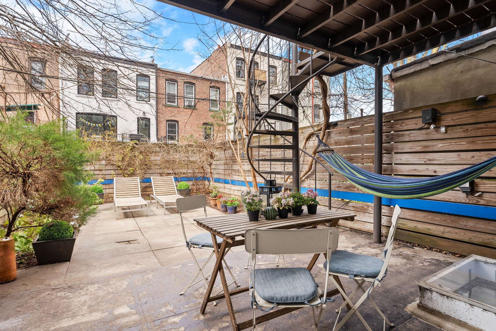 6 Virginia Place Brooklyn, NY 11213 - Photo 18 of 26 a building outdoor space with patio furniture and potted plants
