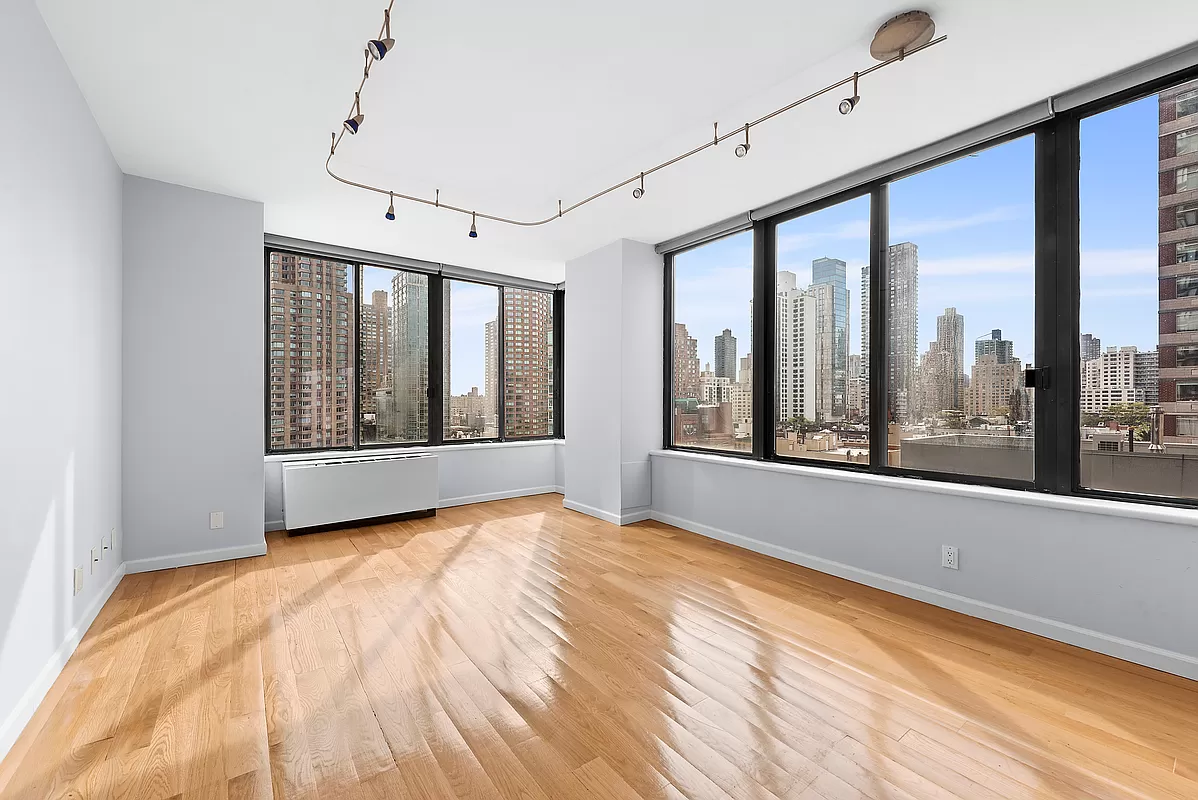 300 East 93rd Street, Unit 14F Manhattan, NY 10128 - Photo 2 of 14 a view of an empty room with a window