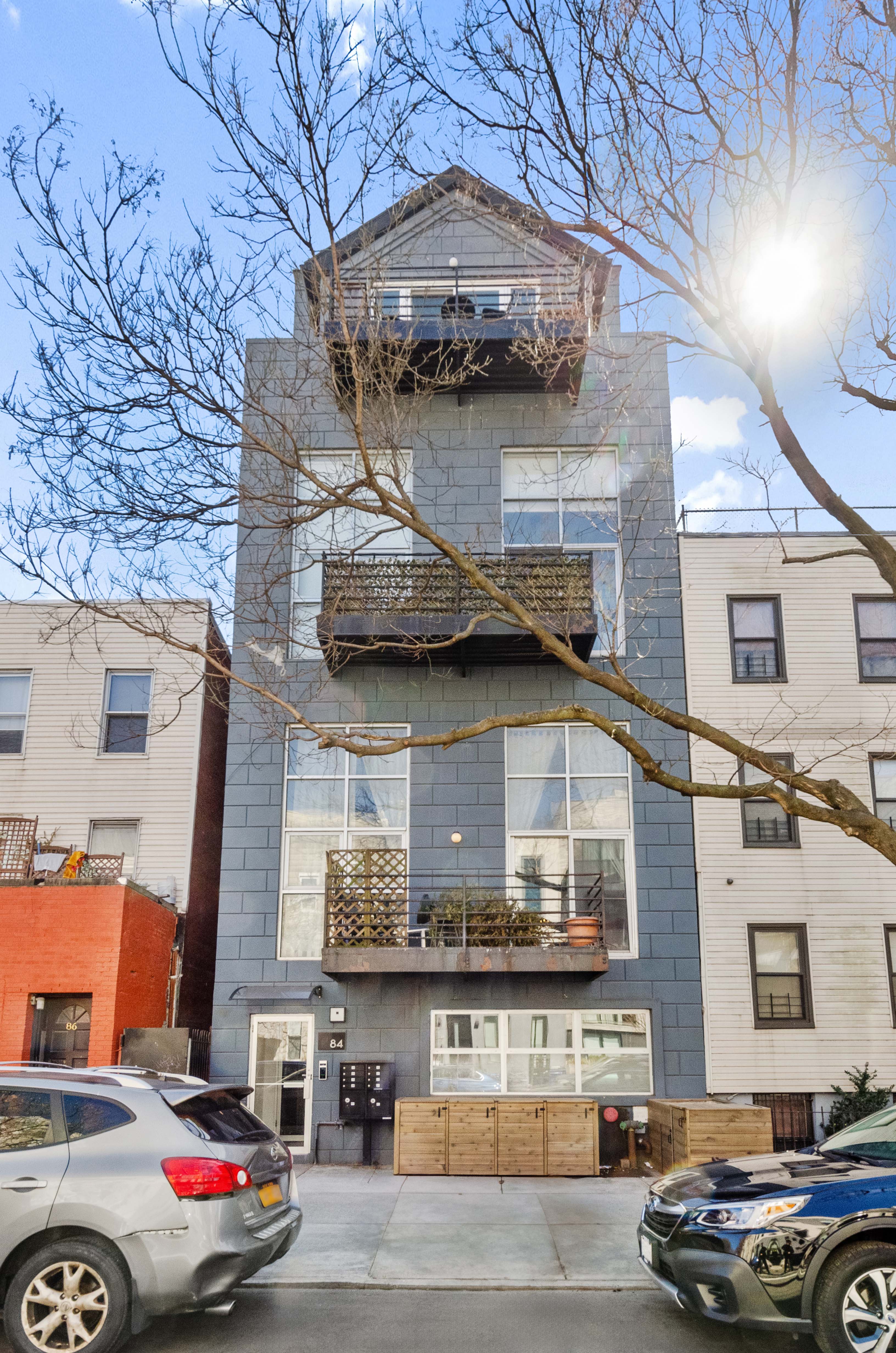 84 Eagle Street, Unit 2D Brooklyn, NY 11222 - Photo 9 of 10 a car parked in front of a building