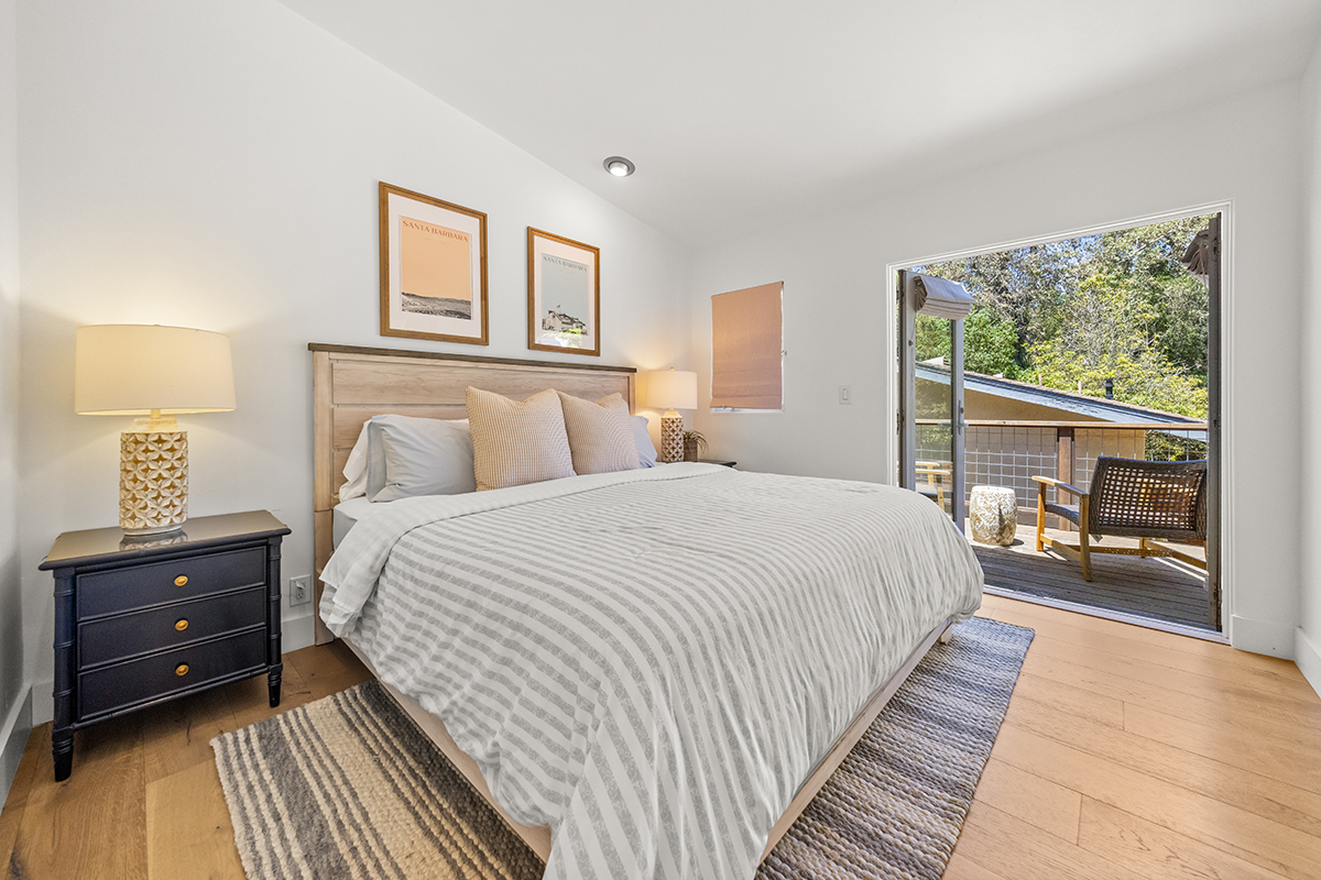 161 Loureyro Road Montecito, CA 93108 - Photo 16 of 52 a bedroom with a bed and a night stand