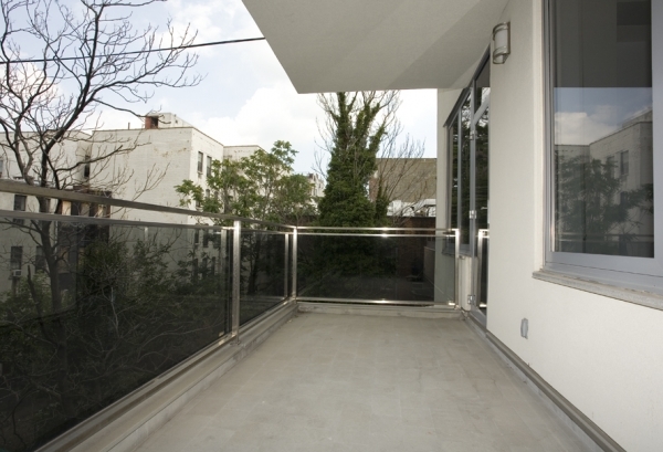 117 West 123rd Street, Unit 4B Manhattan, NY 10027 - Photo 10 of 16 a view of a glass door and a window