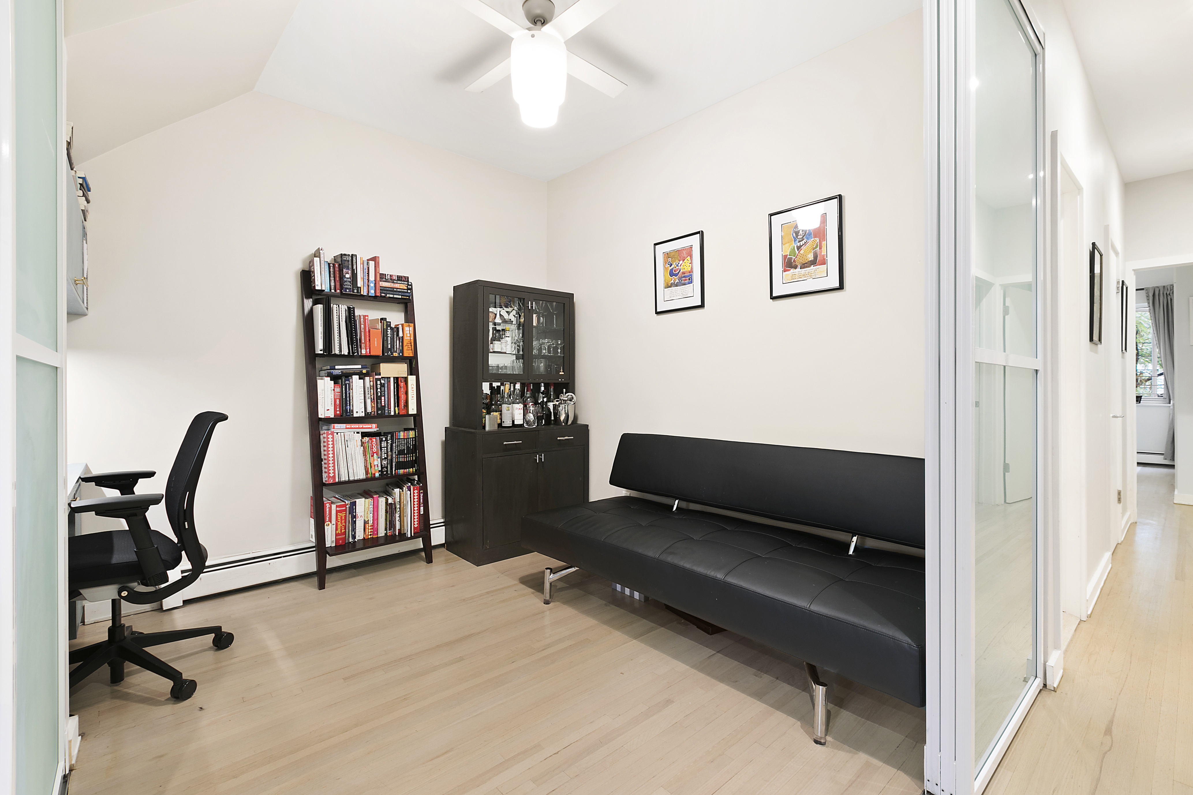 86 Butler Street, Unit 2 Brooklyn, NY 11231 - Photo 3 of 9 a living room with furniture a air conditioner and a window