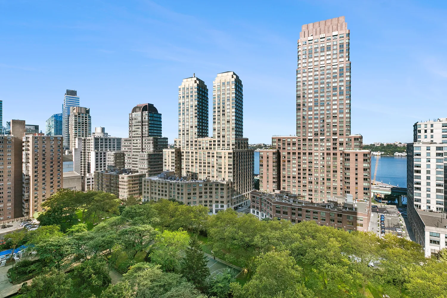 a view of city with tall buildings