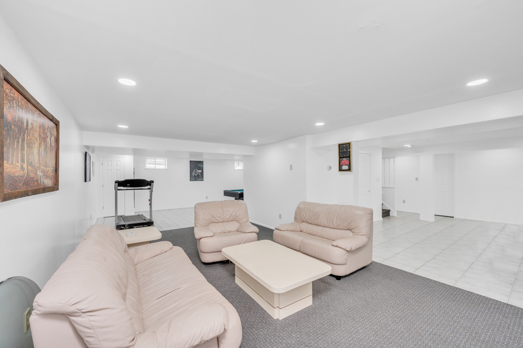 35 Poe Street Staten Island, NY 10307 - Photo 26 of 36 a living room with furniture and a couch