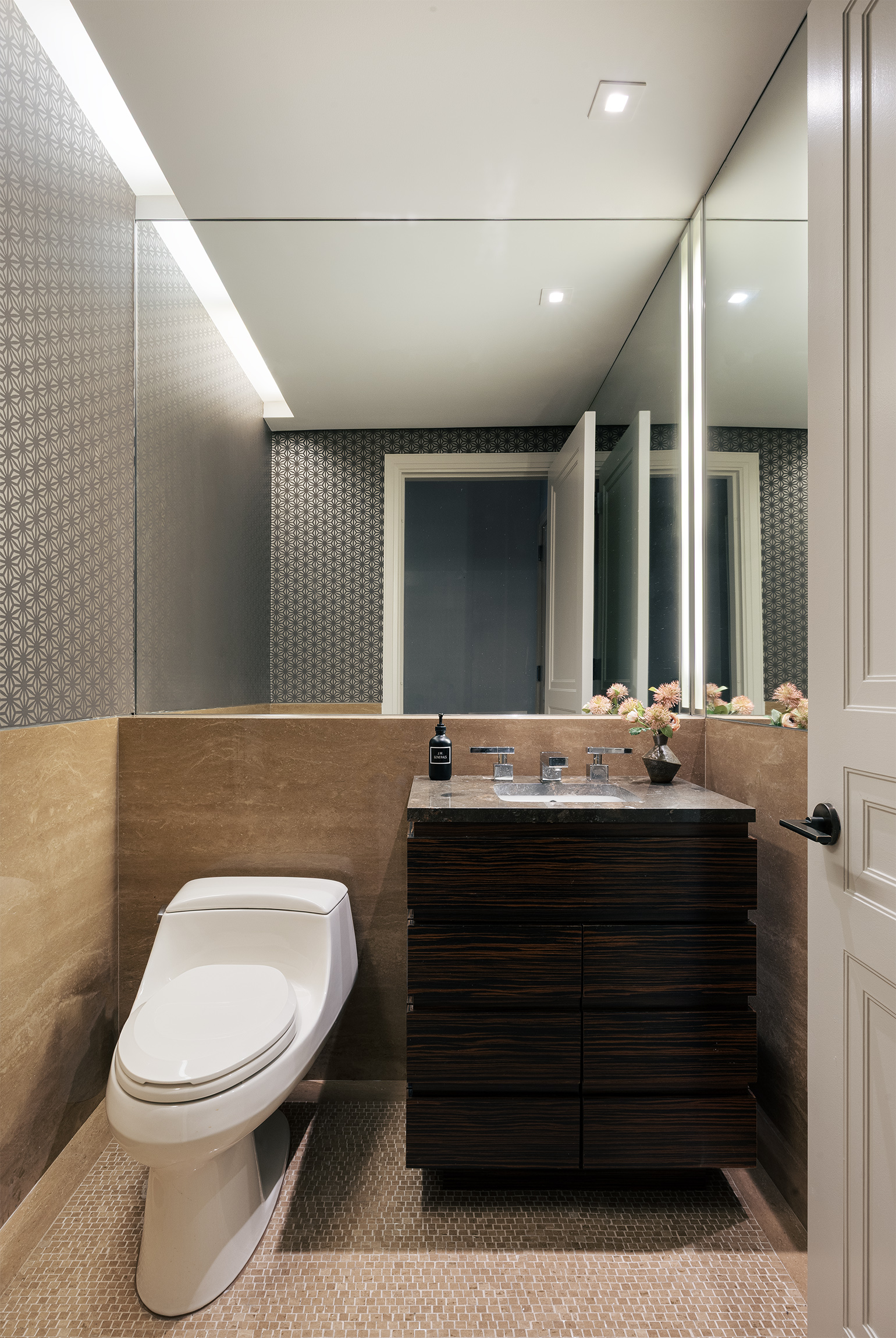 170 East End Avenue, Unit 2A Manhattan, NY 10128 - Photo 15 of 16 a bathroom with a toilet sink and mirror