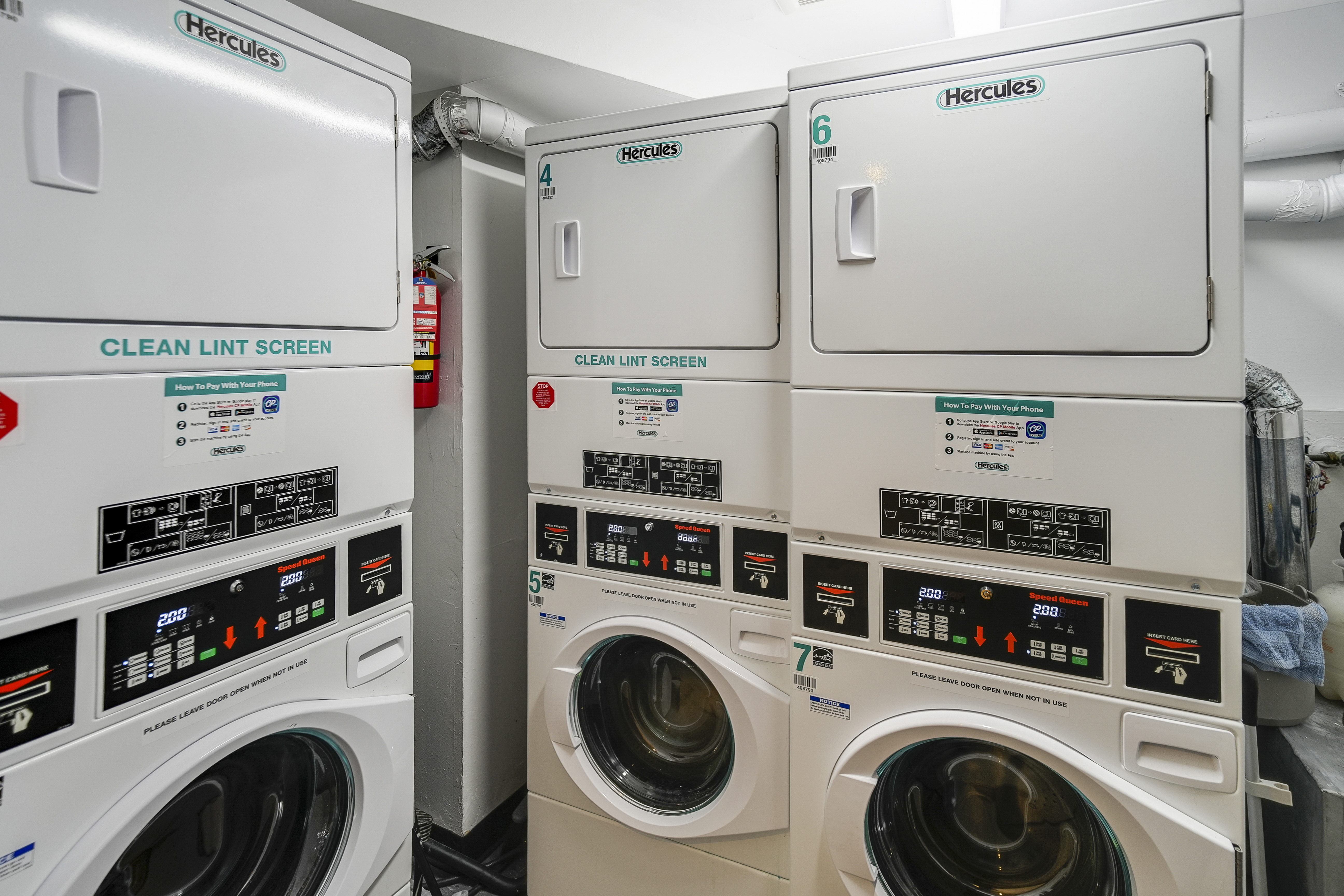 160 East 26th Street, Unit 5F Manhattan, NY 10010 - Photo 9 of 10 a utility room with dryer and washer