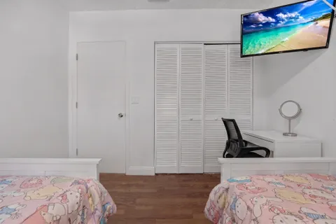 a bedroom with a bed and furniture