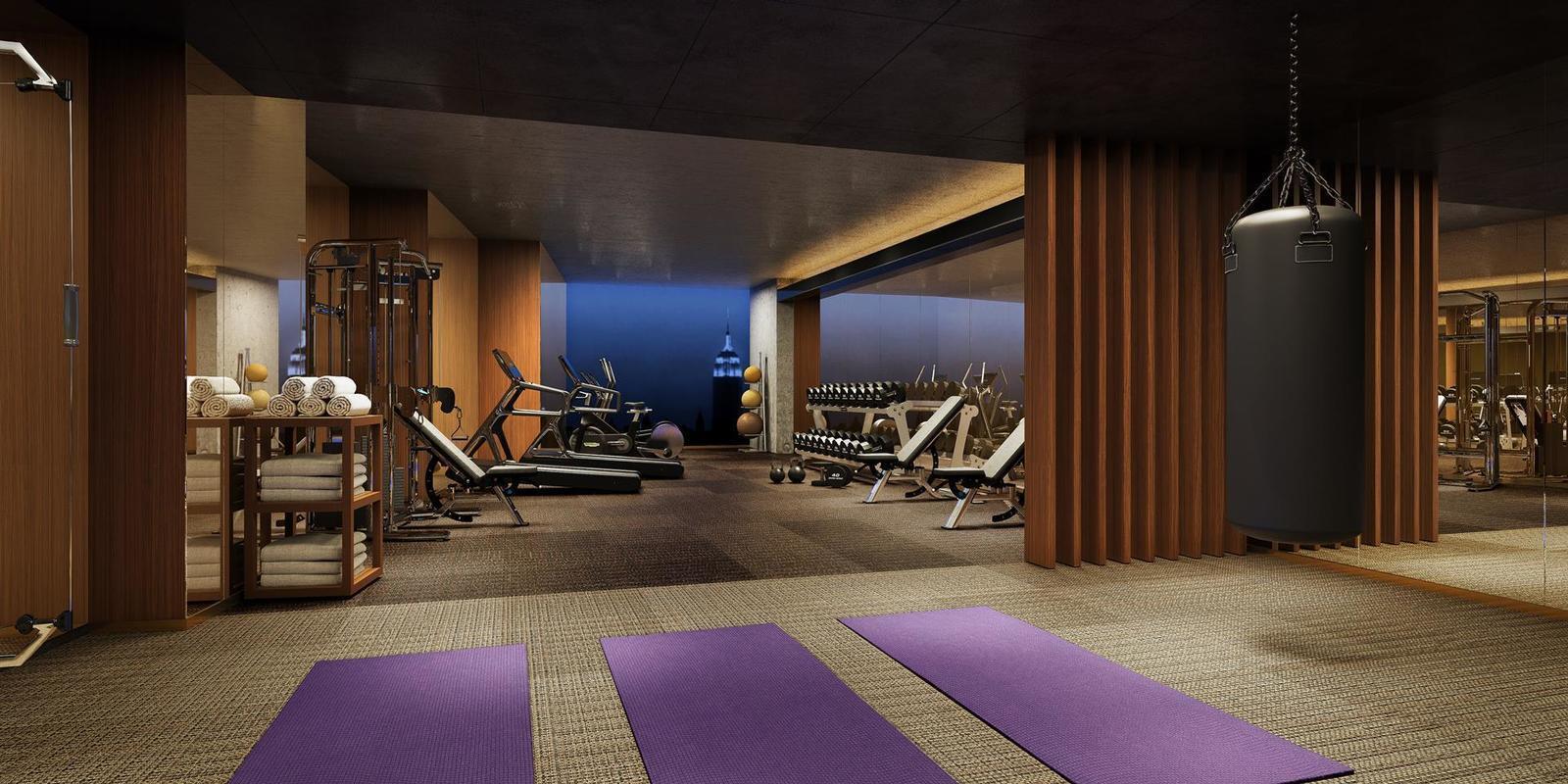 75 Kenmare Street, Unit 3B Manhattan, NY 10012 - Photo 6 of 8 a view of a room with gym equipment