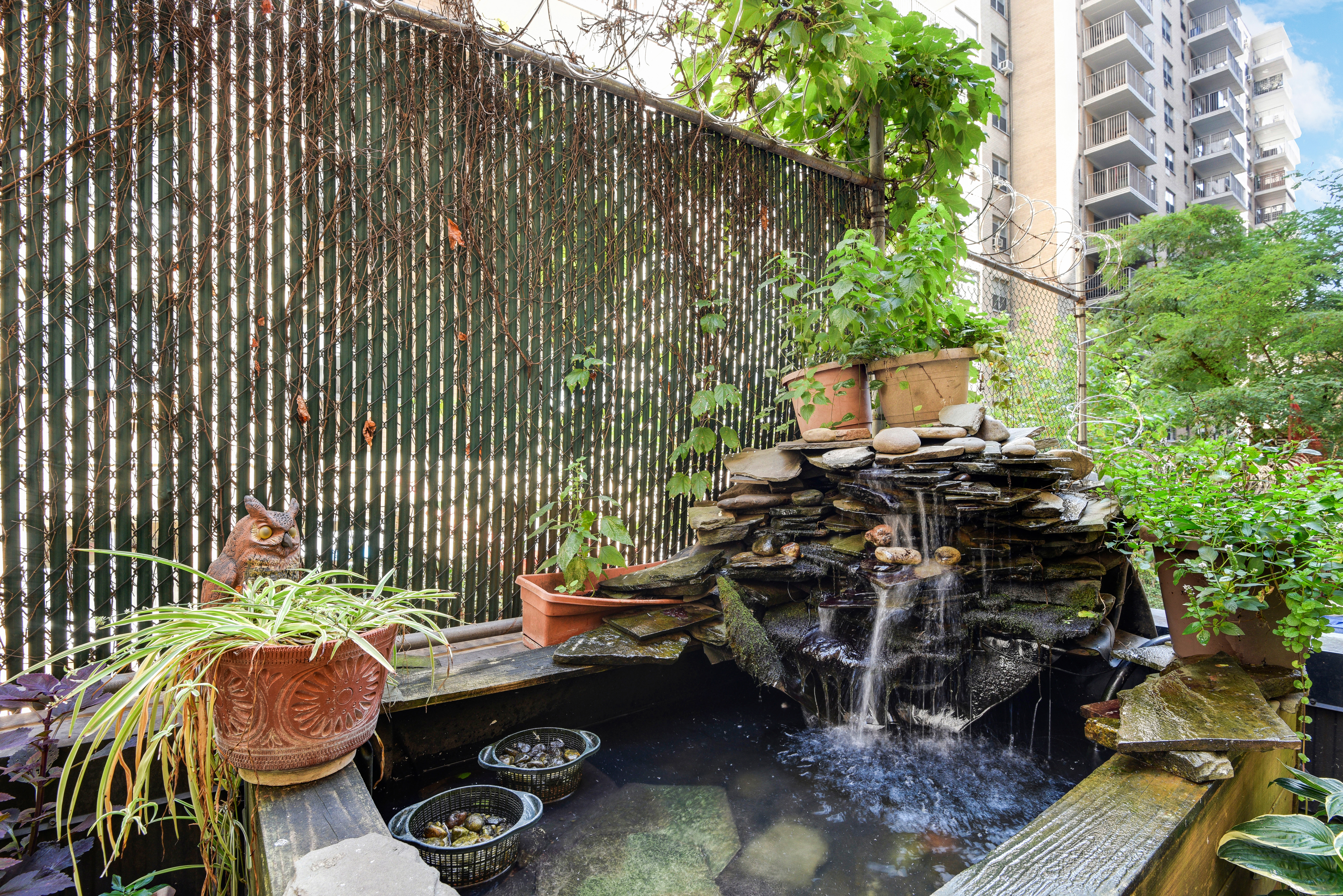 41 West 96th Street, Unit 1B Manhattan, NY 10025 - Photo 7 of 24 a view of a chairs and table in a backyard