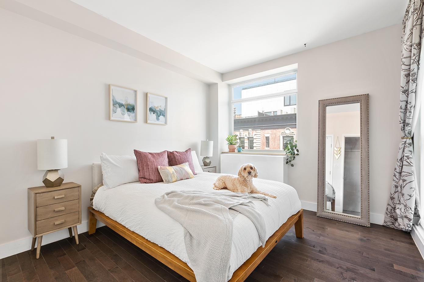 88 Morningside Avenue, Unit 8E Manhattan, NY 10027 - Photo 5 of 7 a bedroom with a bed and wooden floor