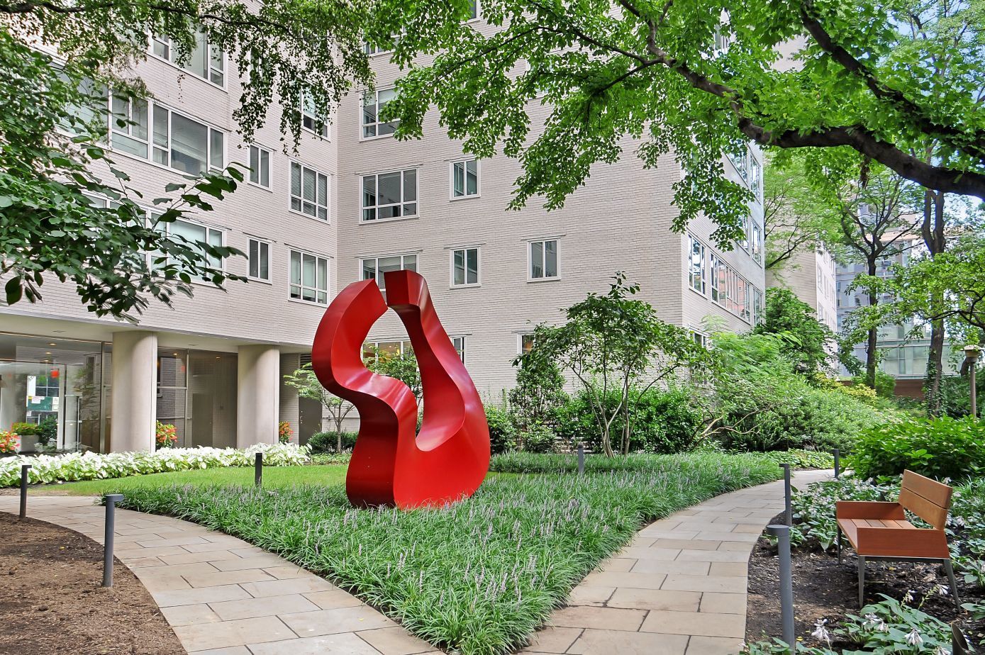 a aerial view of a house with swimming pool and garden
