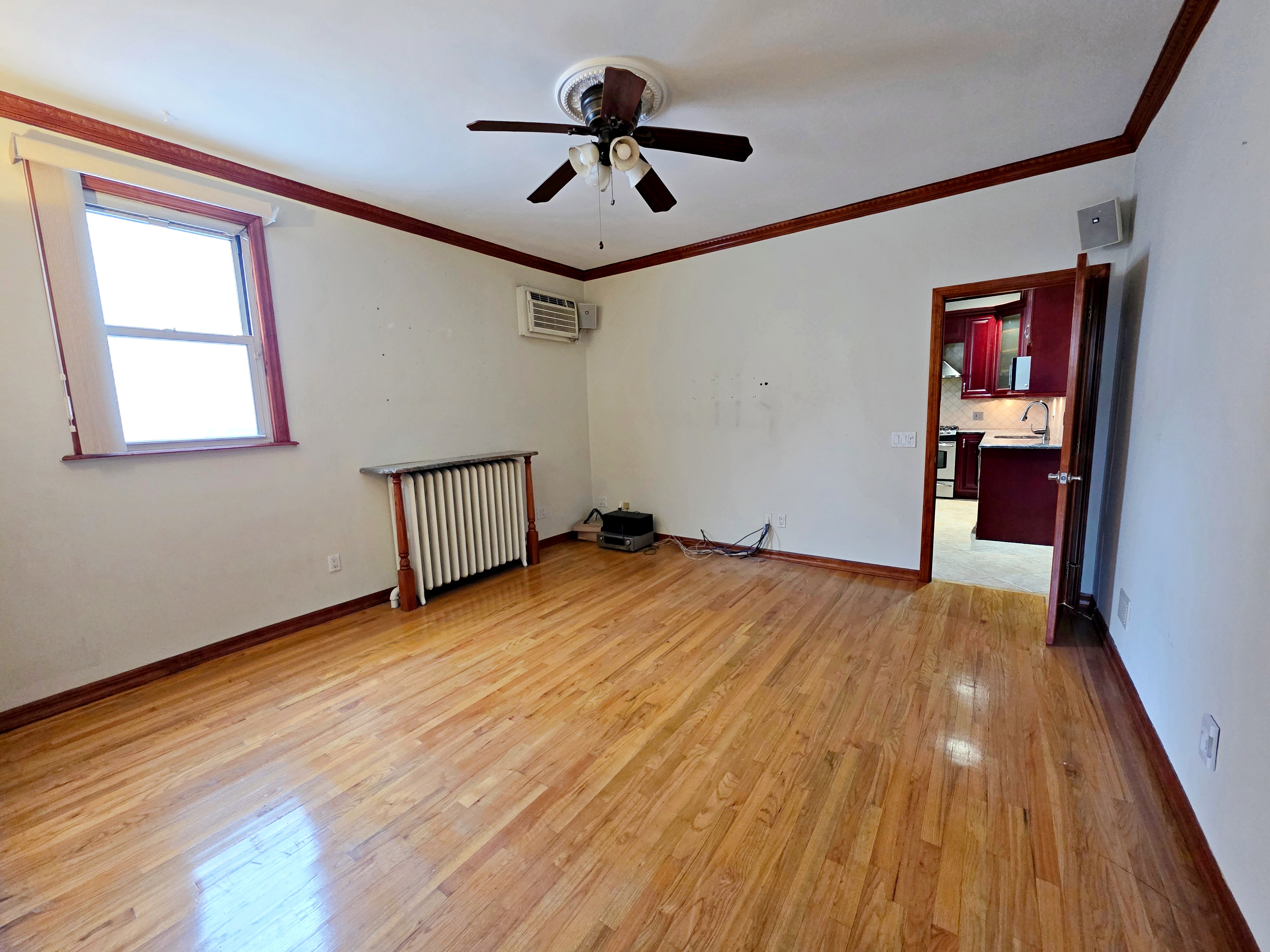 714 Lorimer Street, Unit 1 Brooklyn, NY 11211 - Photo 6 of 7 a view of empty room with wooden floor