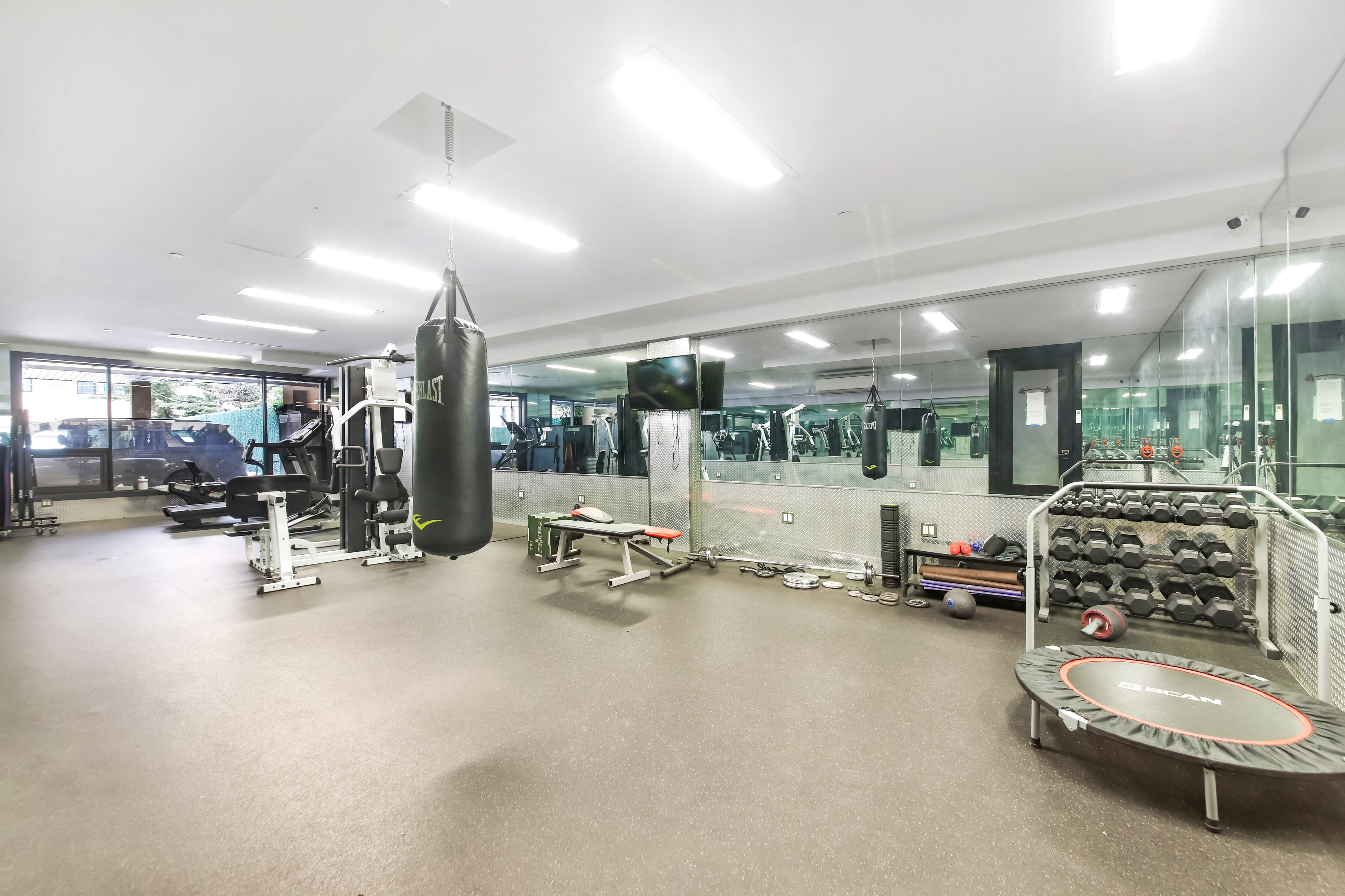 1756 Ocean Avenue, Unit 6D Brooklyn, NY 11230 - Photo 10 of 11 a view of a room with gym equipment
