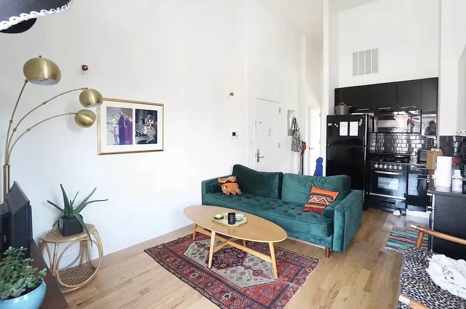 a living room with furniture and a table