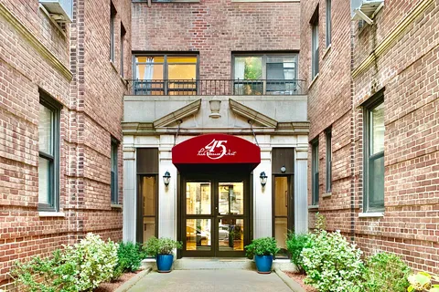 a view of a brick building with a large windows