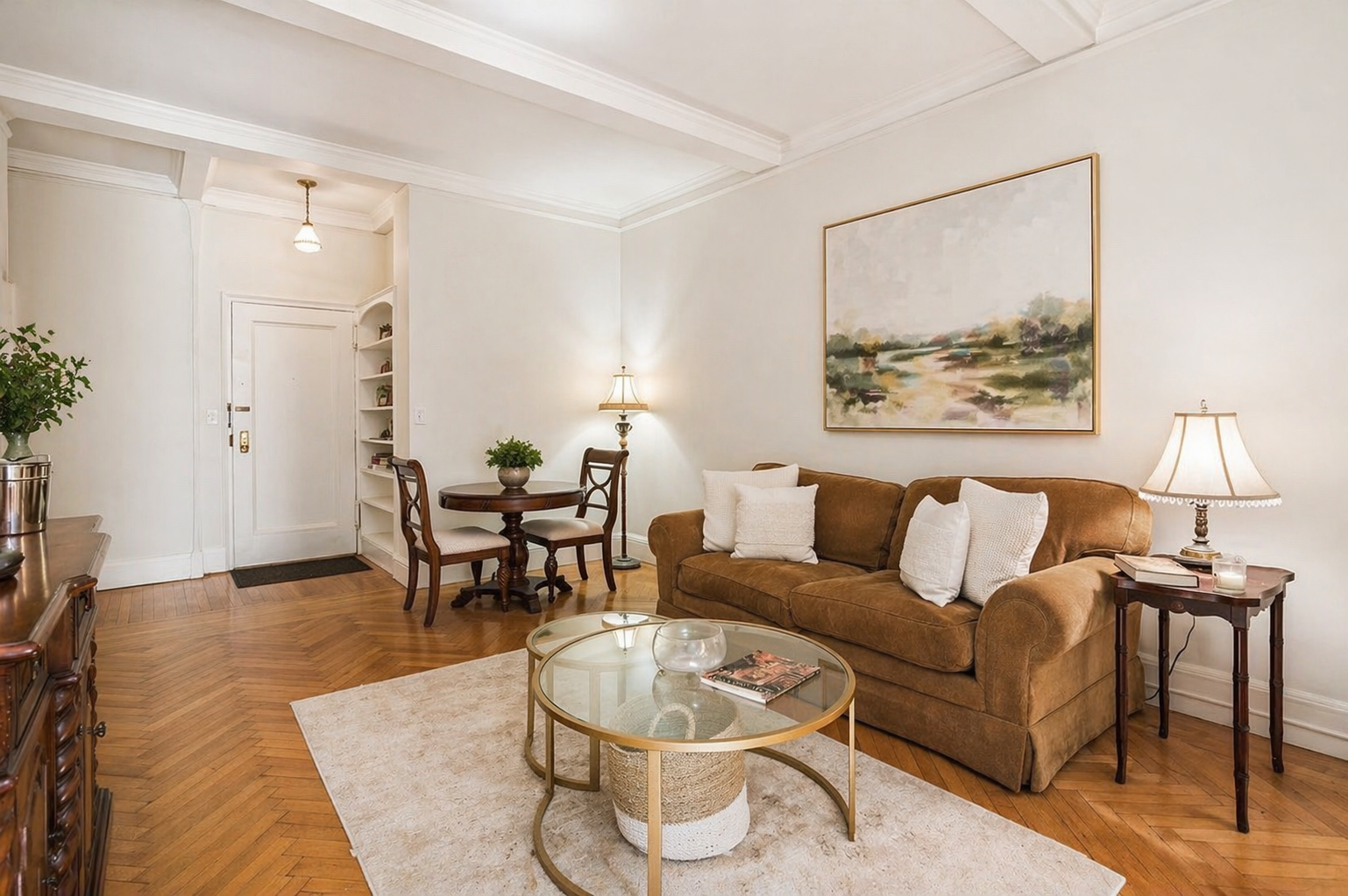 1060 Park Avenue, Unit 3A Manhattan, NY 10128 - Photo 2 of 11 a living room with furniture and wooden floor
