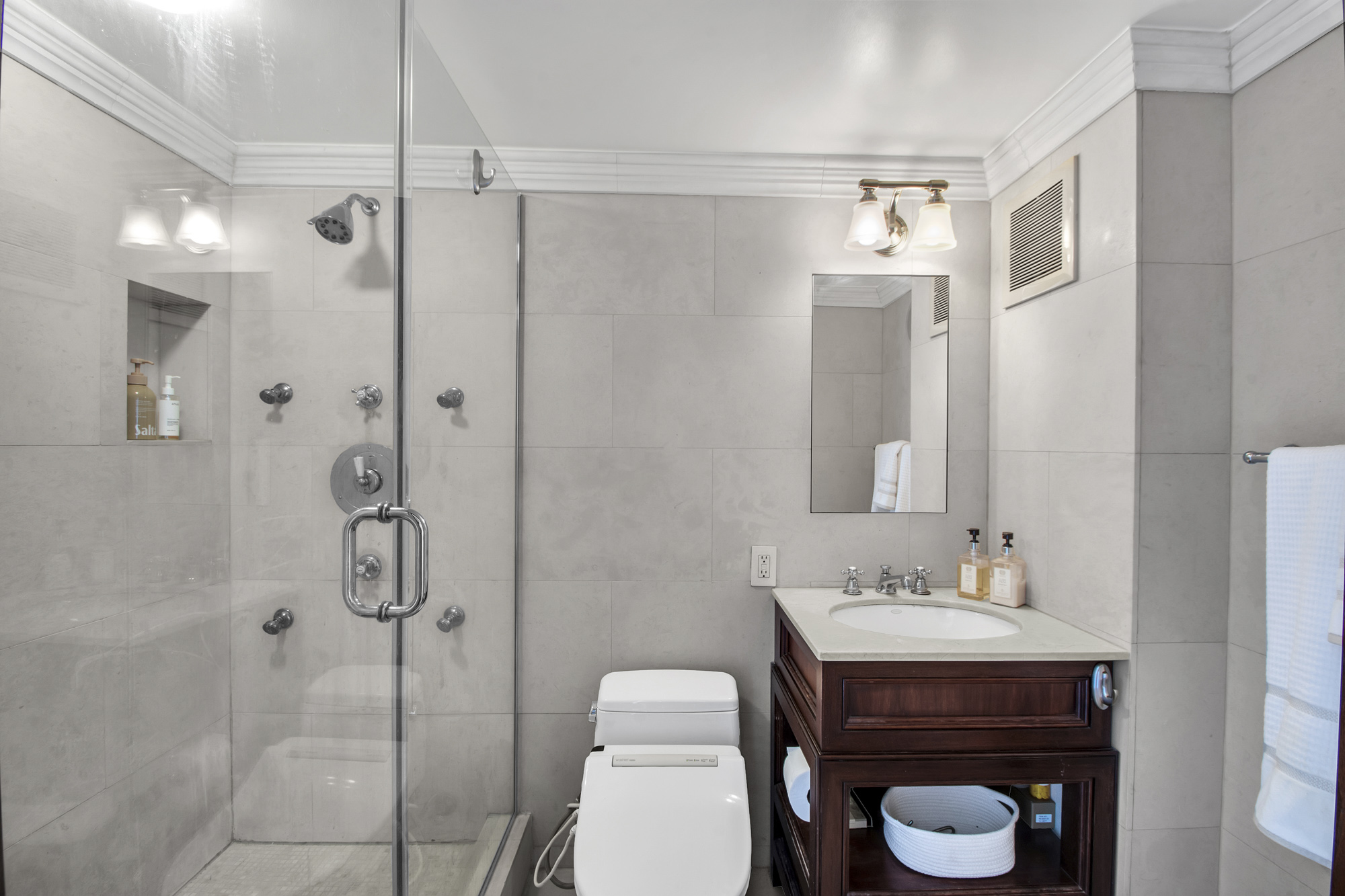 21 South End Avenue, Unit PH1A Manhattan, NY 10280 - Photo 17 of 32 a bathroom with a sink a toilet and shower