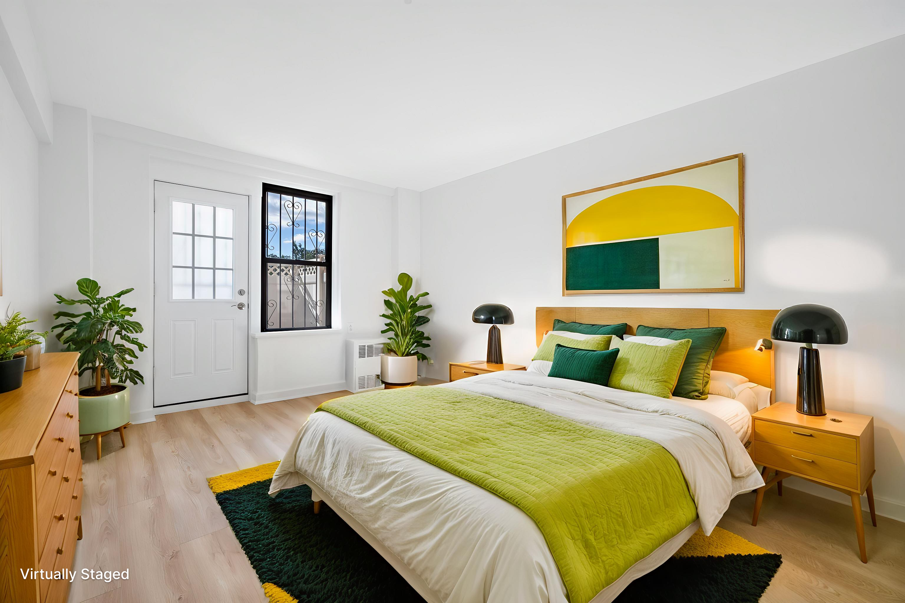 35-20 Leverich Street, Unit B226 Queens, NY 11372 - Photo 7 of 15 a bedroom with a bed and wooden floor