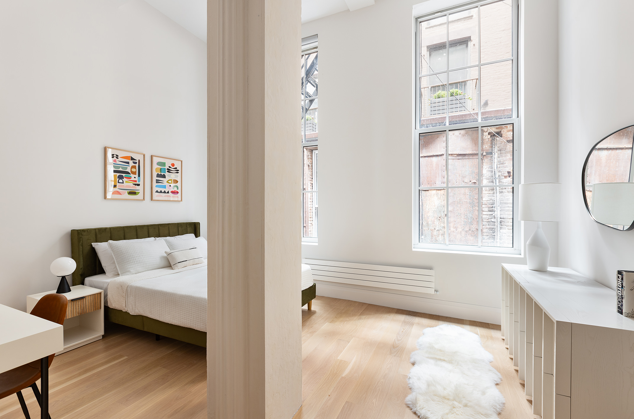 66 Reade Street, Unit TH Manhattan, NY 10007 - Photo 8 of 18 a view of livingroom with furniture and window
