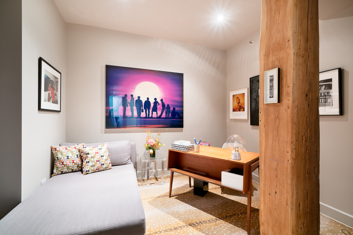 481 Washington Street, Unit 6N Manhattan, NY 10013 - Photo 4 of 10 a living room with furniture and a rug