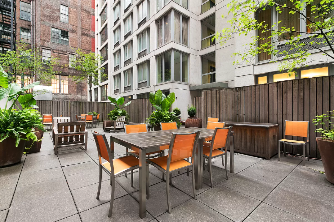 125 West 21st Street, Unit 5B Manhattan, NY 10011 - Photo 11 of 15 a view of a dinning tables and chairs in the patio