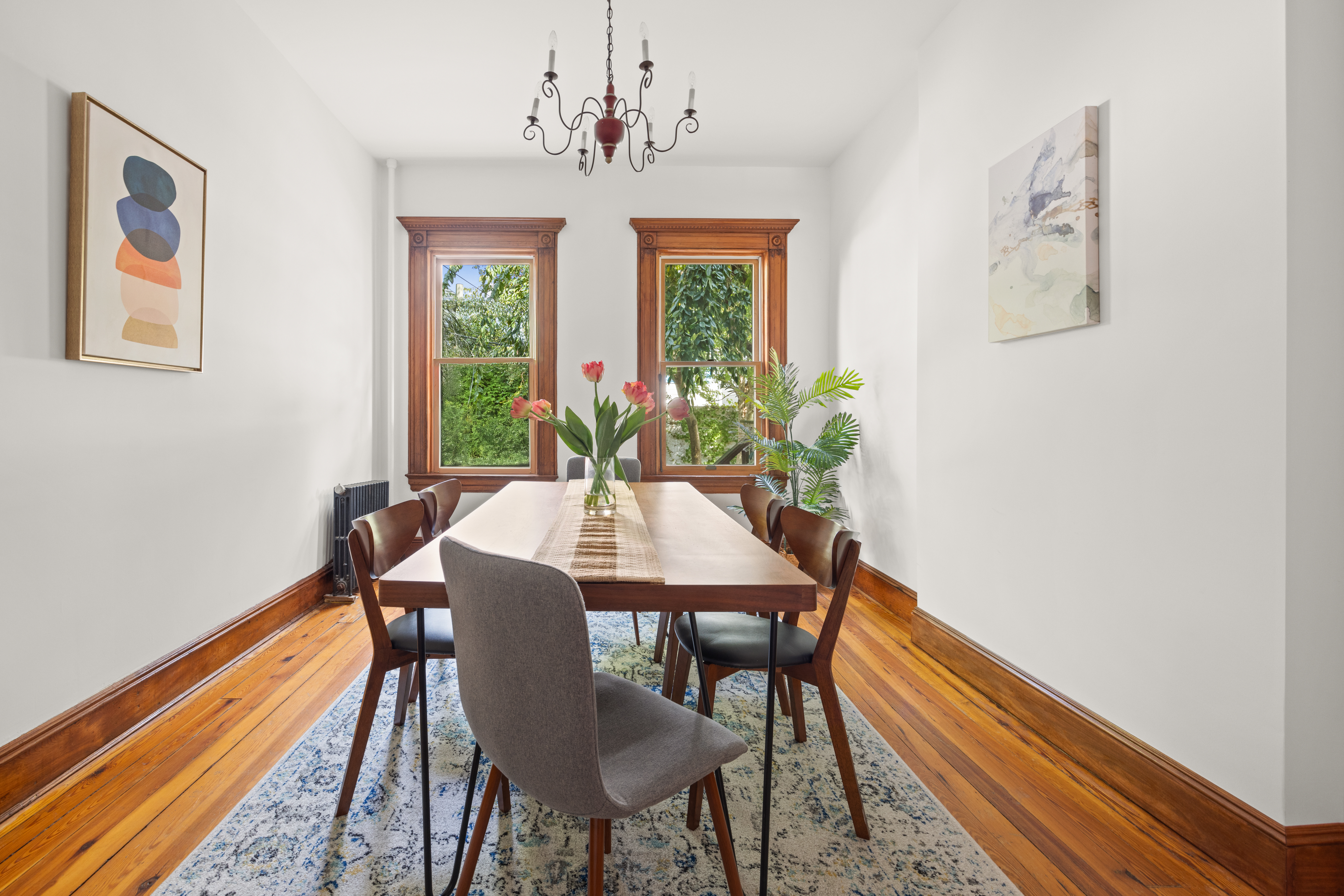 99 East 2nd Street Brooklyn, NY 11218 - Photo 7 of 24 a view of a dining room with furniture window and outside view