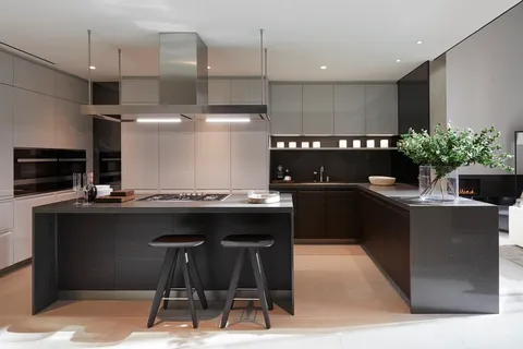 a kitchen with a sink and cabinets
