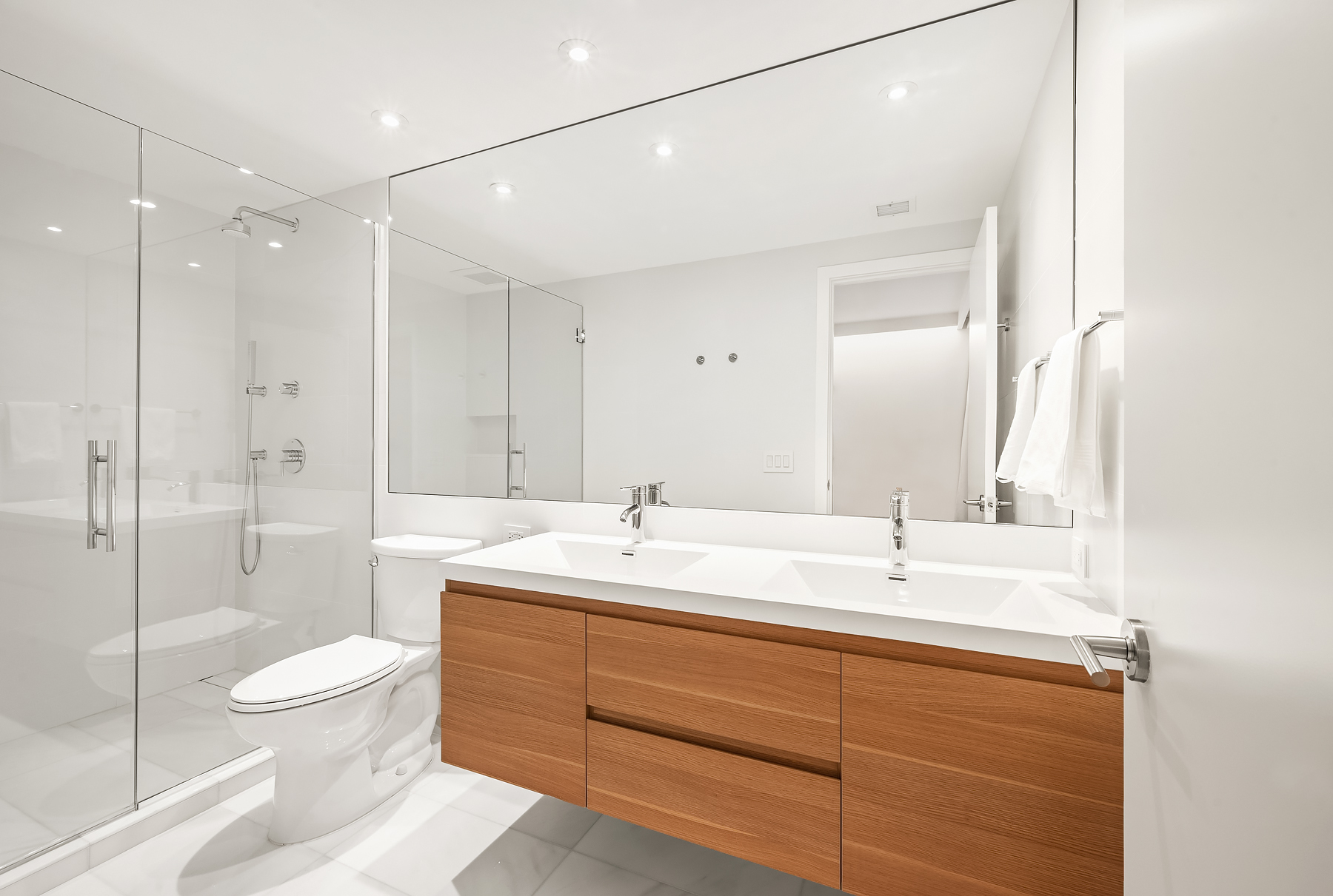 479 Washington Street, Unit 4 Manhattan, NY 10013 - Photo 7 of 8 a bathroom with a sink a toilet and shower