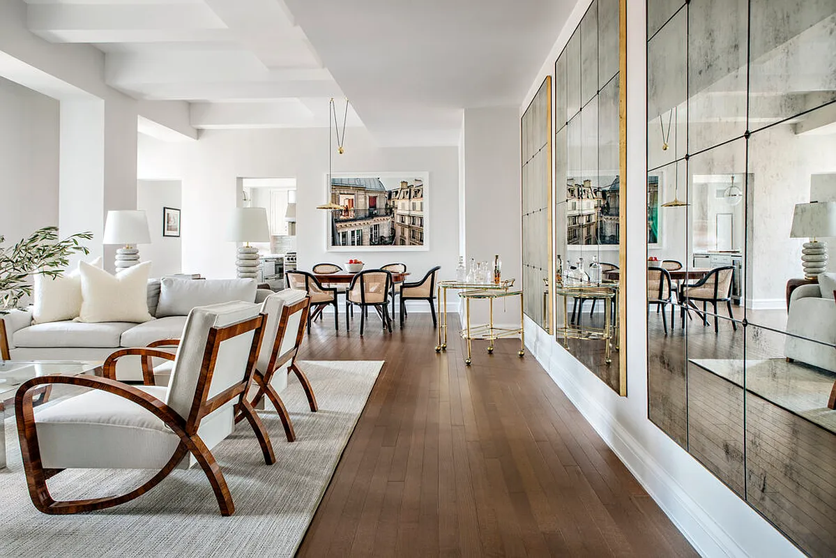 160 West 12th Street, Unit 96 Manhattan, NY 10011 - Photo 1 of 2 a dining room with furniture and wooden floor