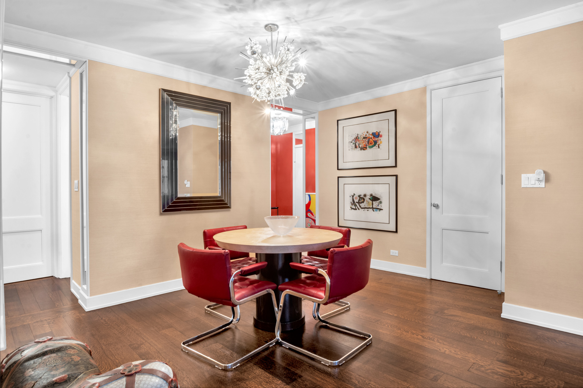 150 East 69th Street, Unit 6Q Manhattan, NY 10021 - Photo 8 of 15 a view of a dining room with furniture window and wooden floor