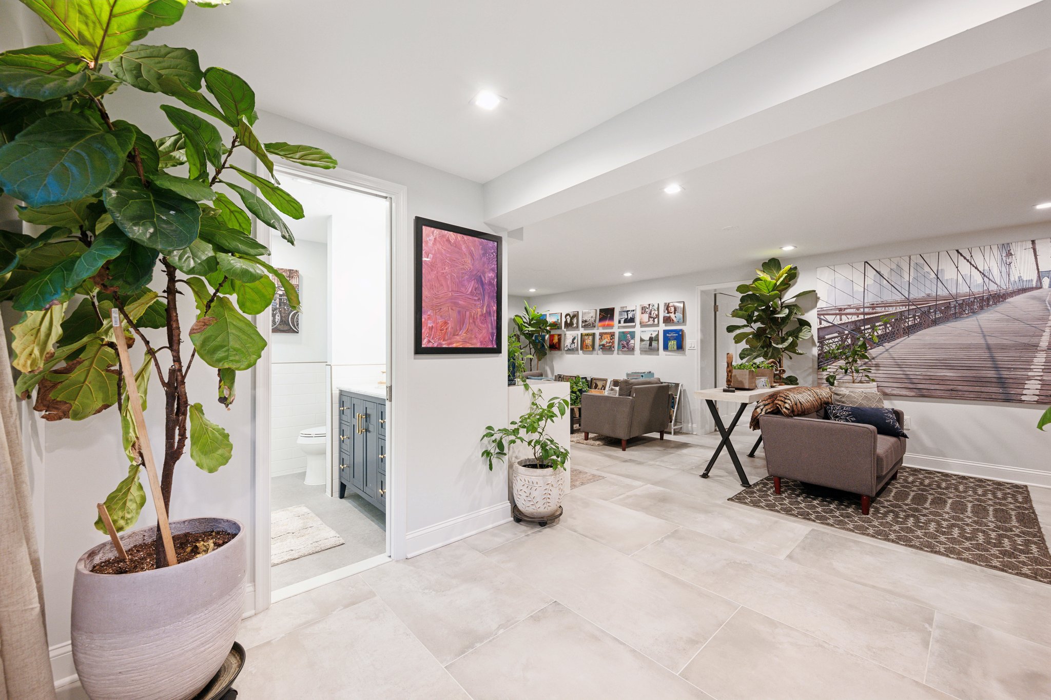 2607 Ross Road Chevy Chase, MD 20815 - Photo 29 of 37 a living room with furniture and a potted plant