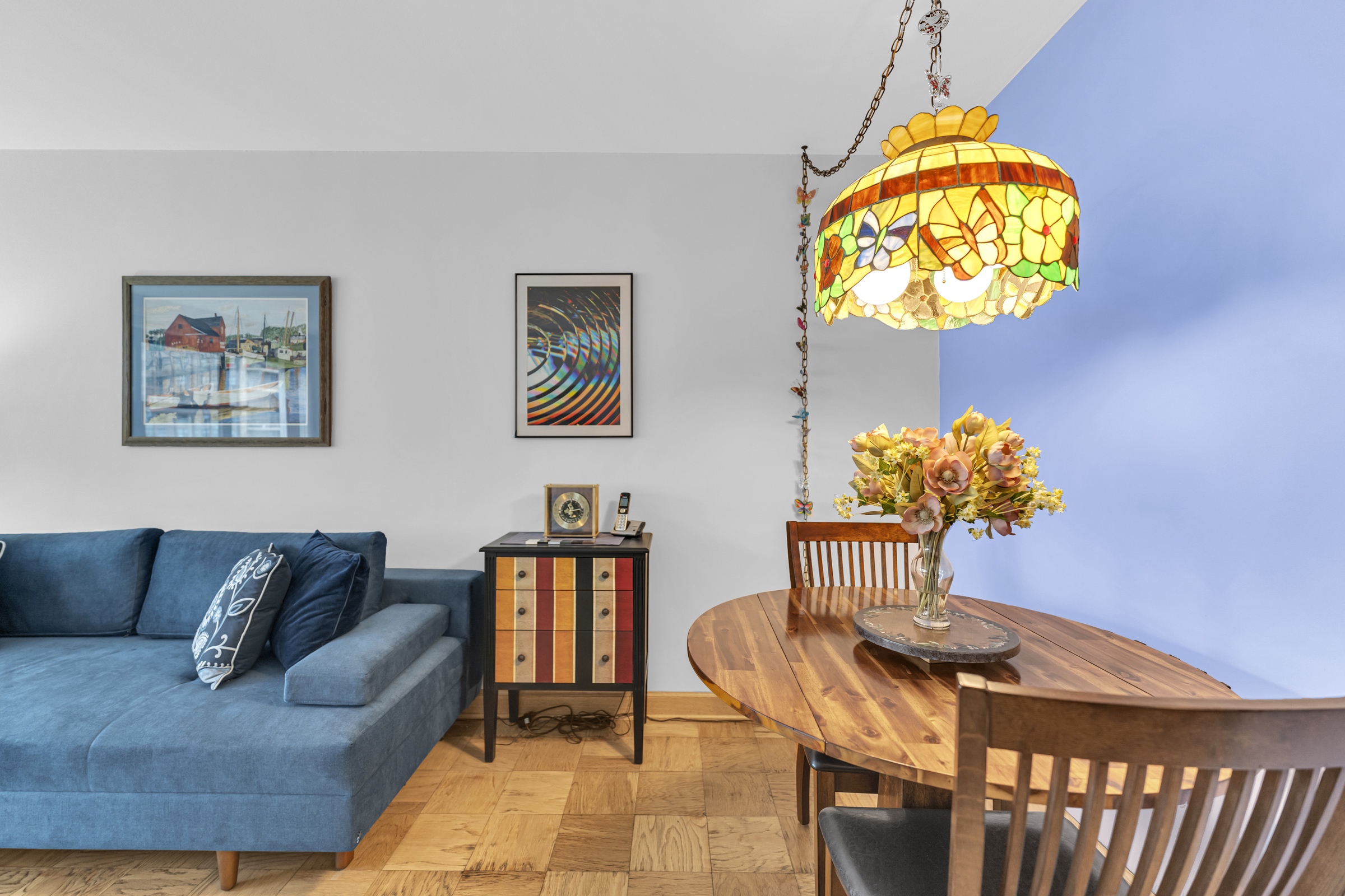 180 West End Avenue, Unit 9P Manhattan, NY 10023 - Photo 4 of 13 a living room with furniture flowerpot and a chandelier