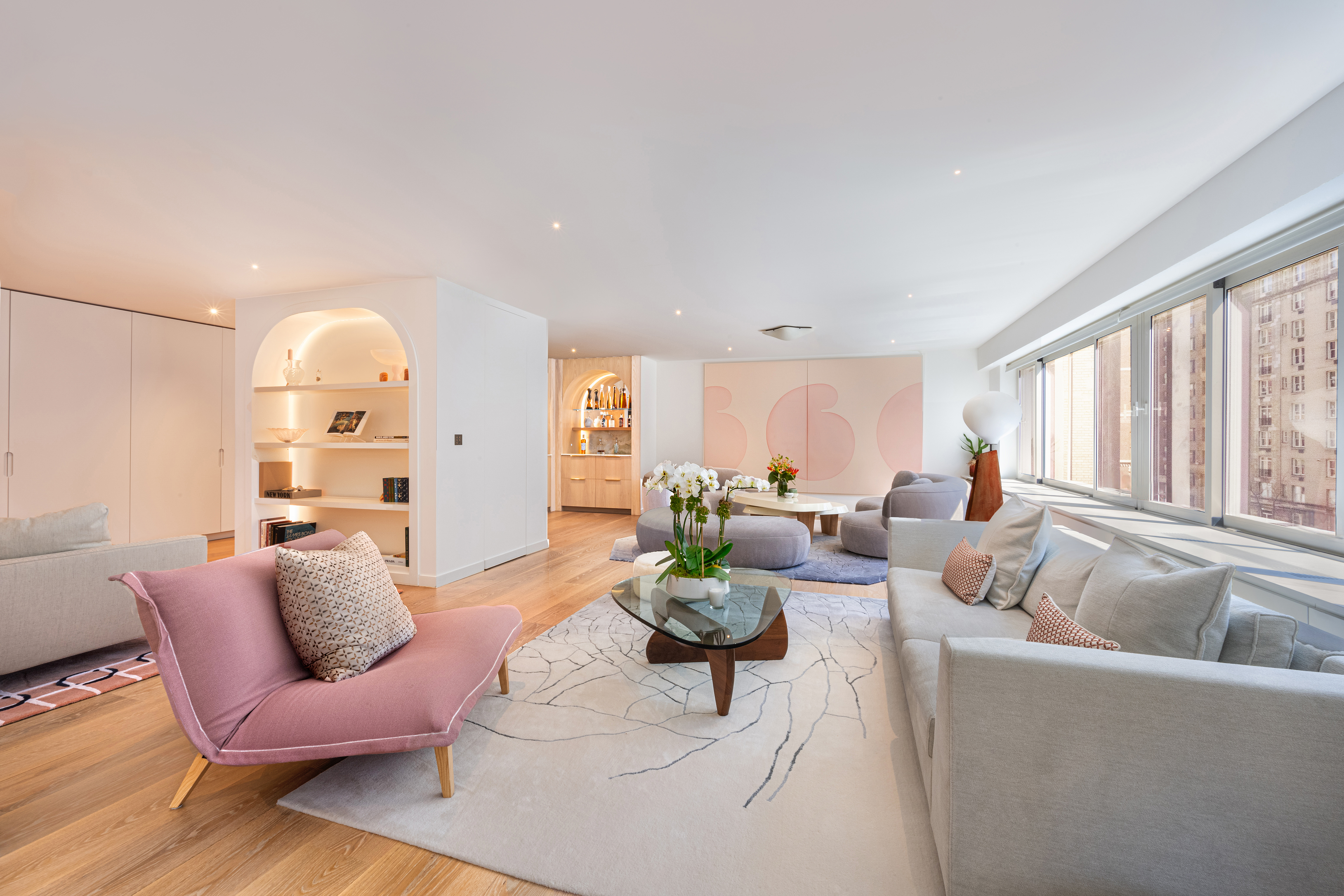 900 Park Avenue, Unit 7ABCE Manhattan, NY 10075 - Photo 2 of 18 a living room with furniture or couch and a large window