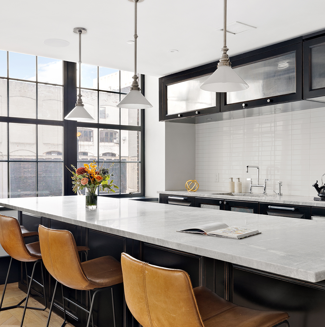 51 Jay Street, Unit 3C Brooklyn, NY 11201 - Photo 3 of 10 a kitchen with stainless steel appliances granite countertop a sink and a stove