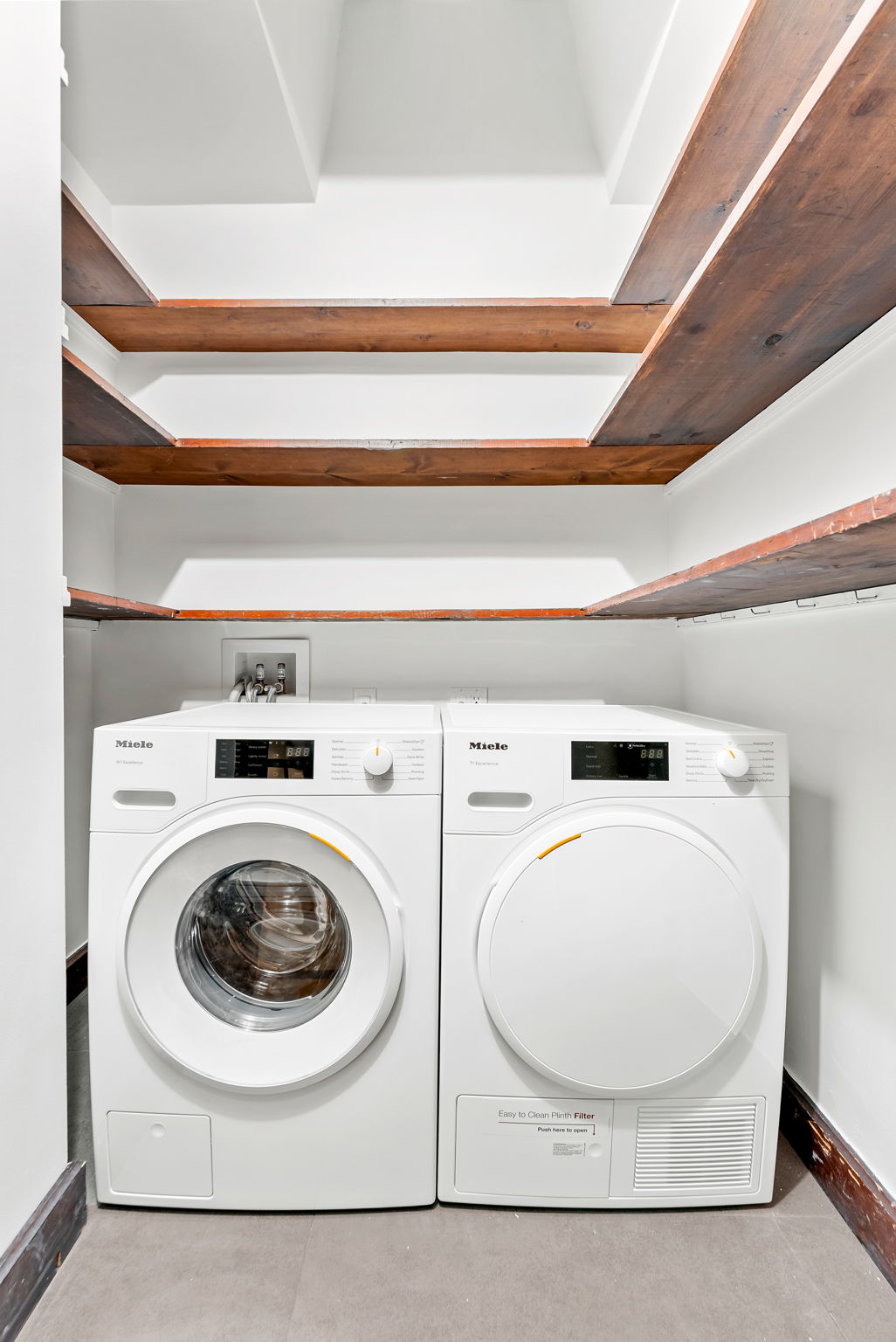 694 10th Street, Unit 2 Brooklyn, NY 11215 - Photo 16 of 22 a utility room with dryer and washer