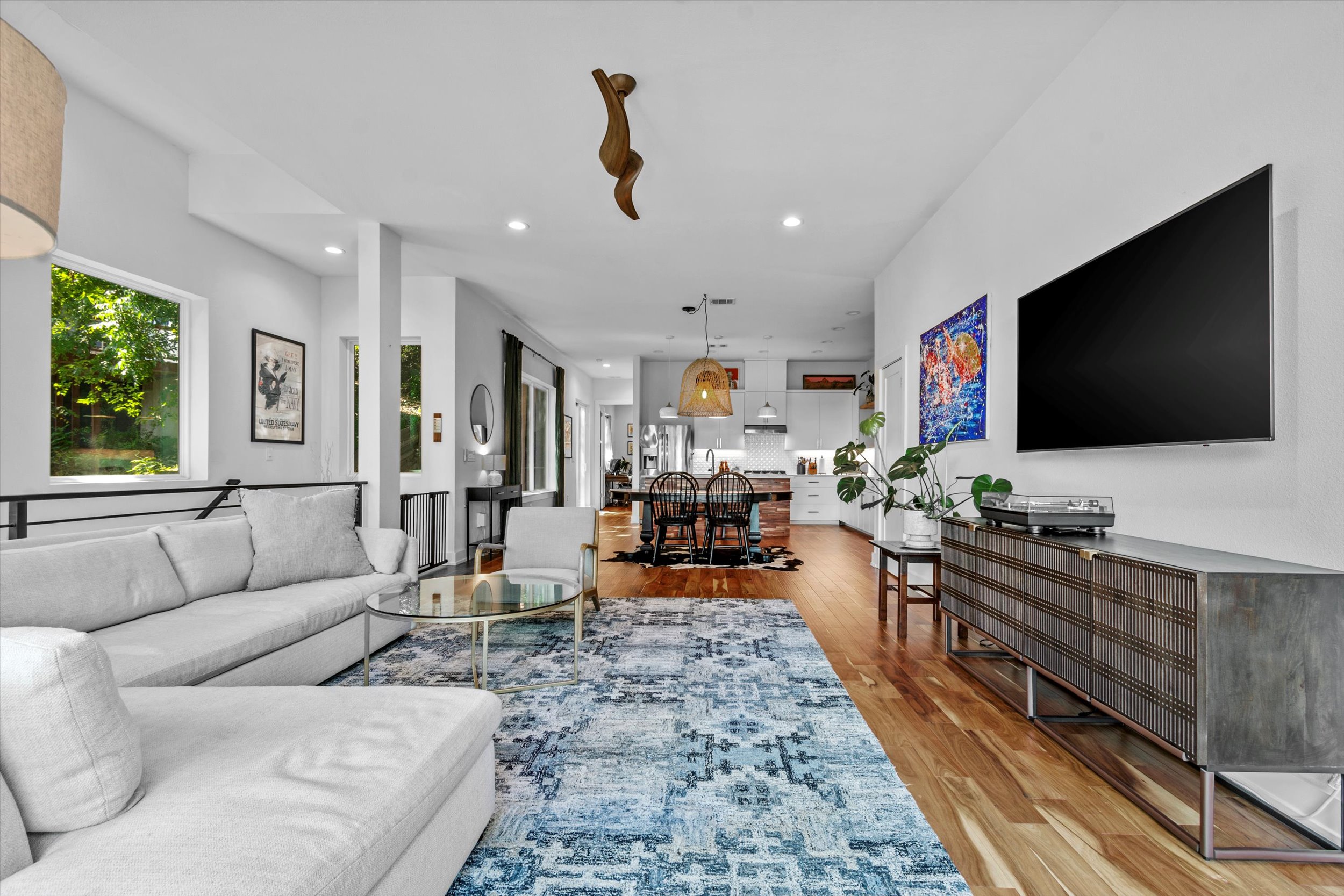2712 Oak Springs Drive, Unit A Austin, TX 78702 - Photo 29 of 38 a living room with furniture and a flat screen tv