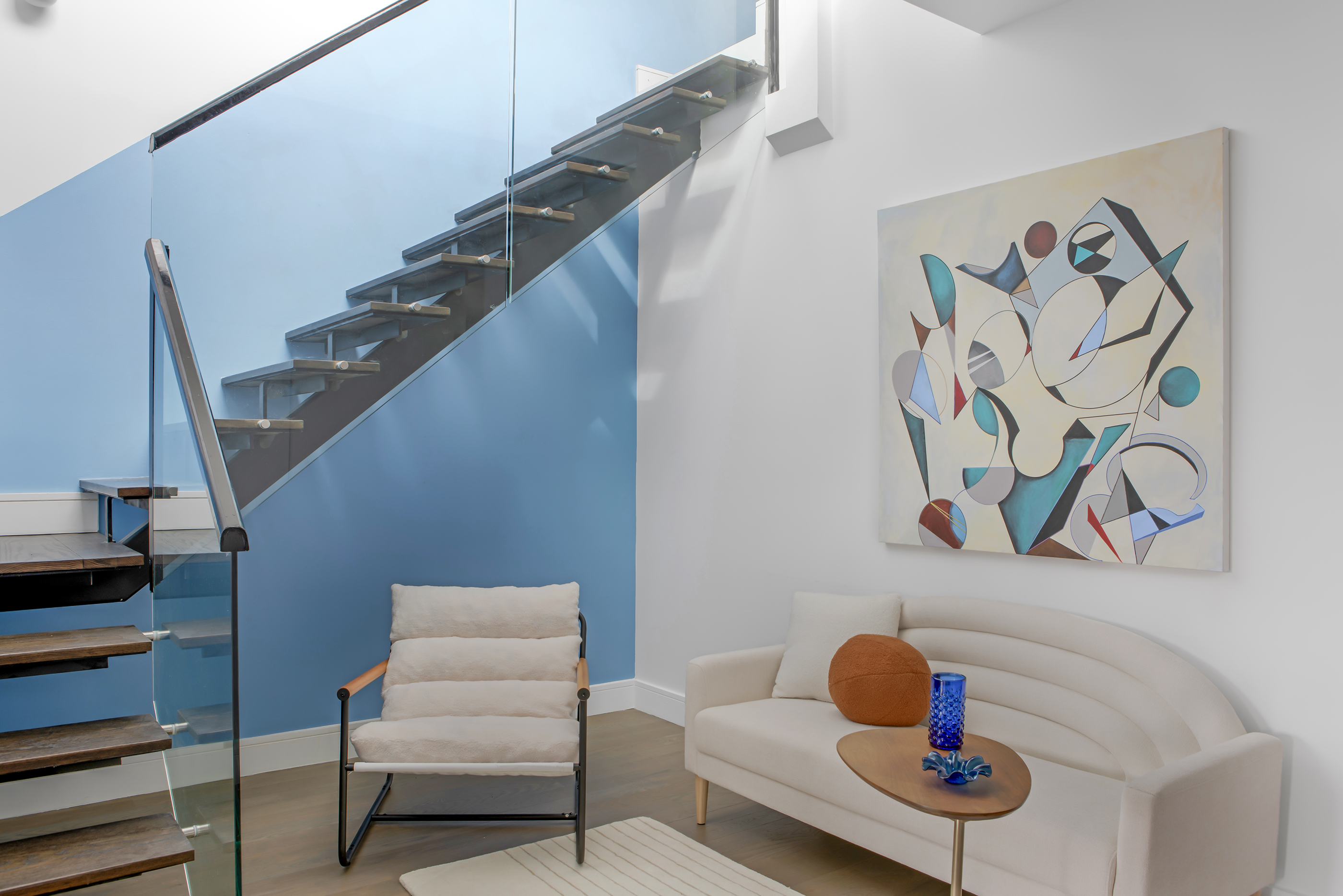 476 Hancock Street, Unit 3 Brooklyn, NY 11233 - Photo 6 of 9 a living room with furniture and stairs