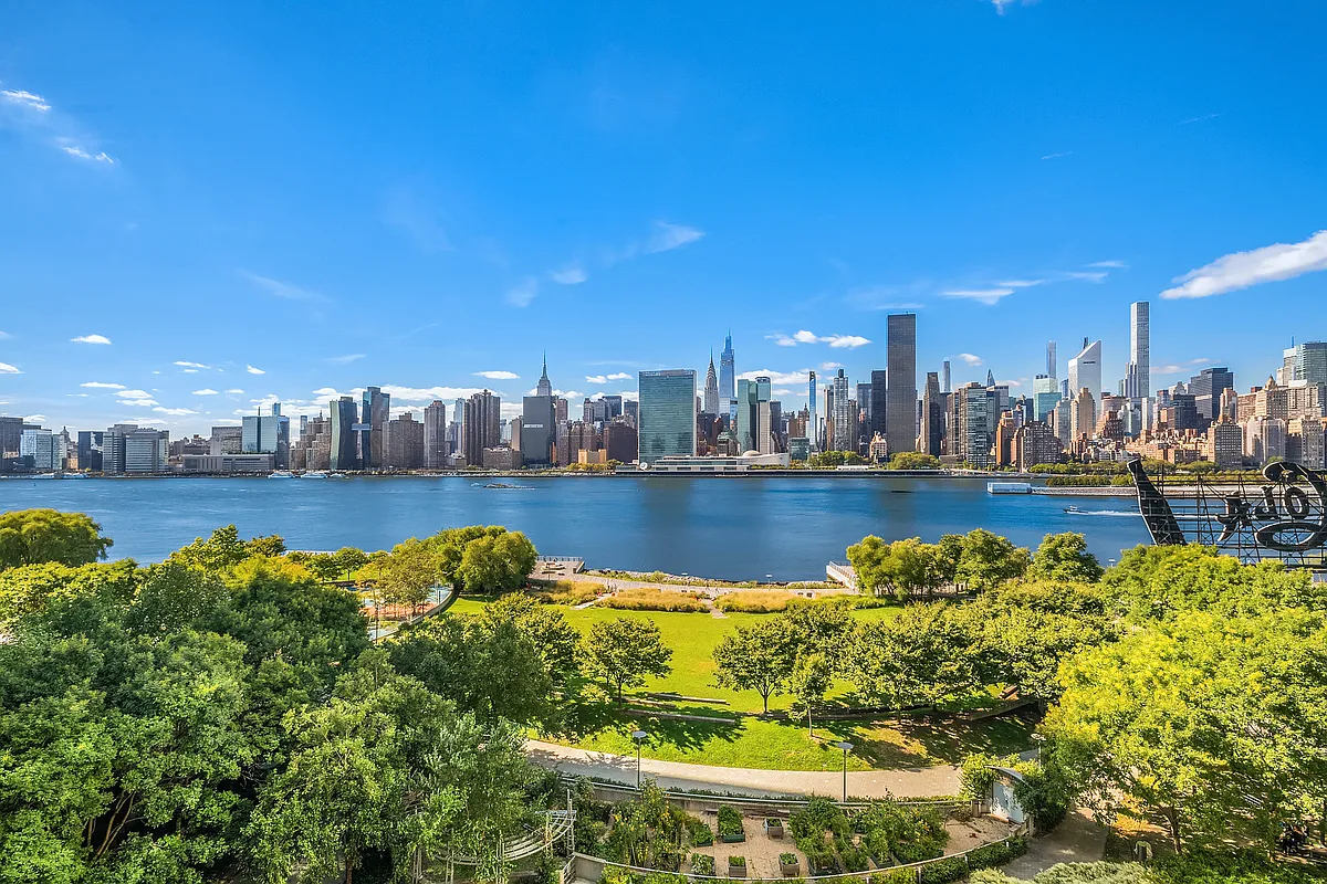46-30 Center Boulevard, Unit 710 Queens, NY 11109 - Photo 8 of 25 a view of a lake with a house