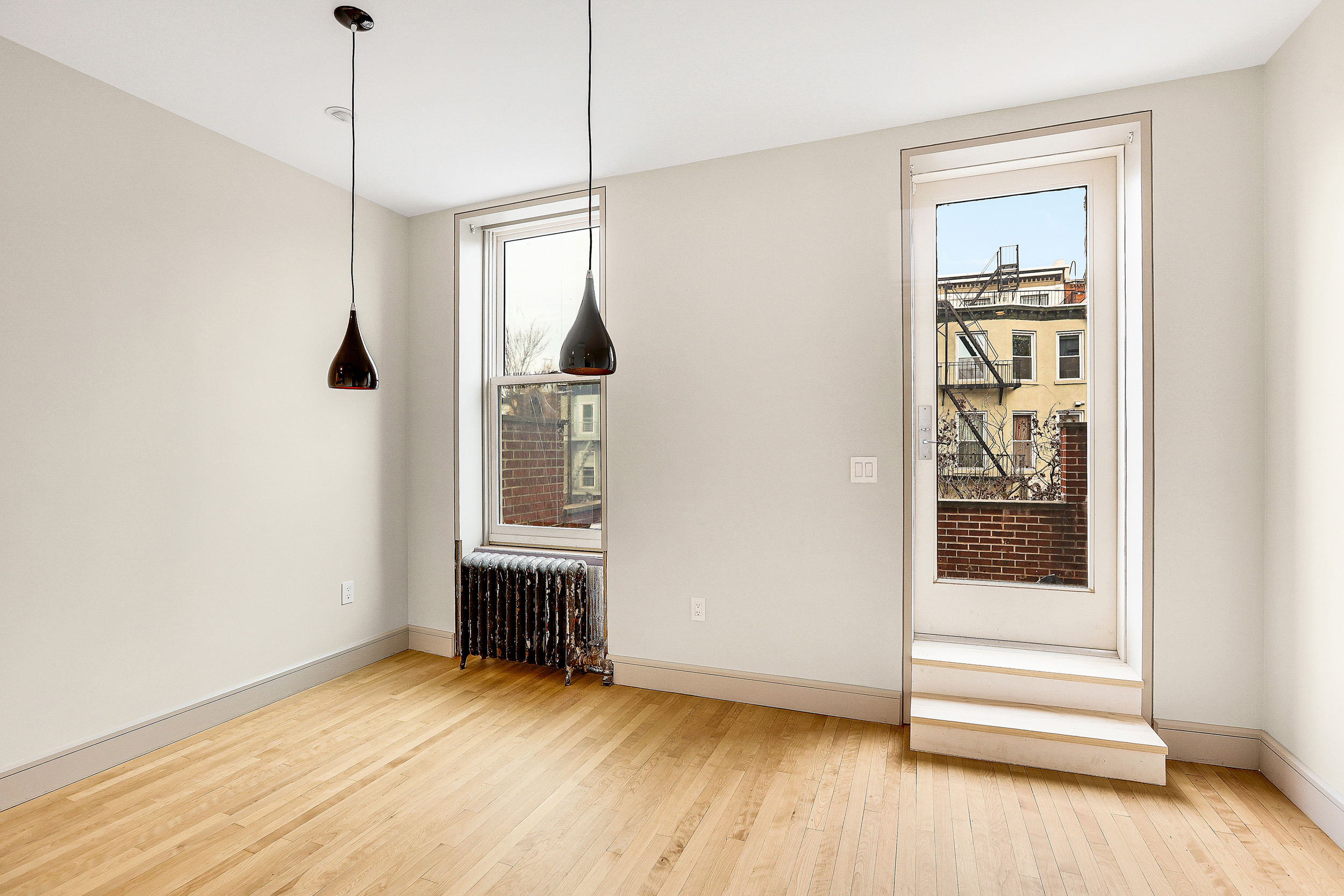 187 President Street, Unit 2 Brooklyn, NY 11231 - Photo 8 of 17 a view of an empty room with a window