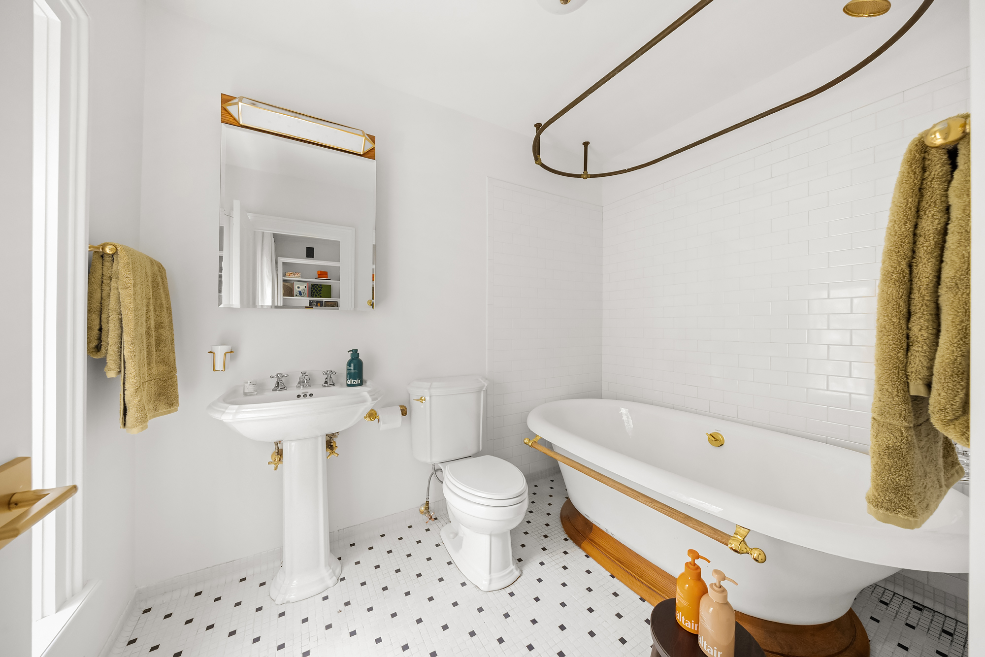 112 West 13th Street Manhattan, NY 10011 - Photo 31 of 46 a bathroom with a sink toilet and shower