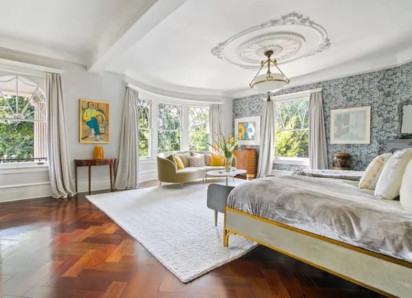 a view of a porch with a floor to ceiling window