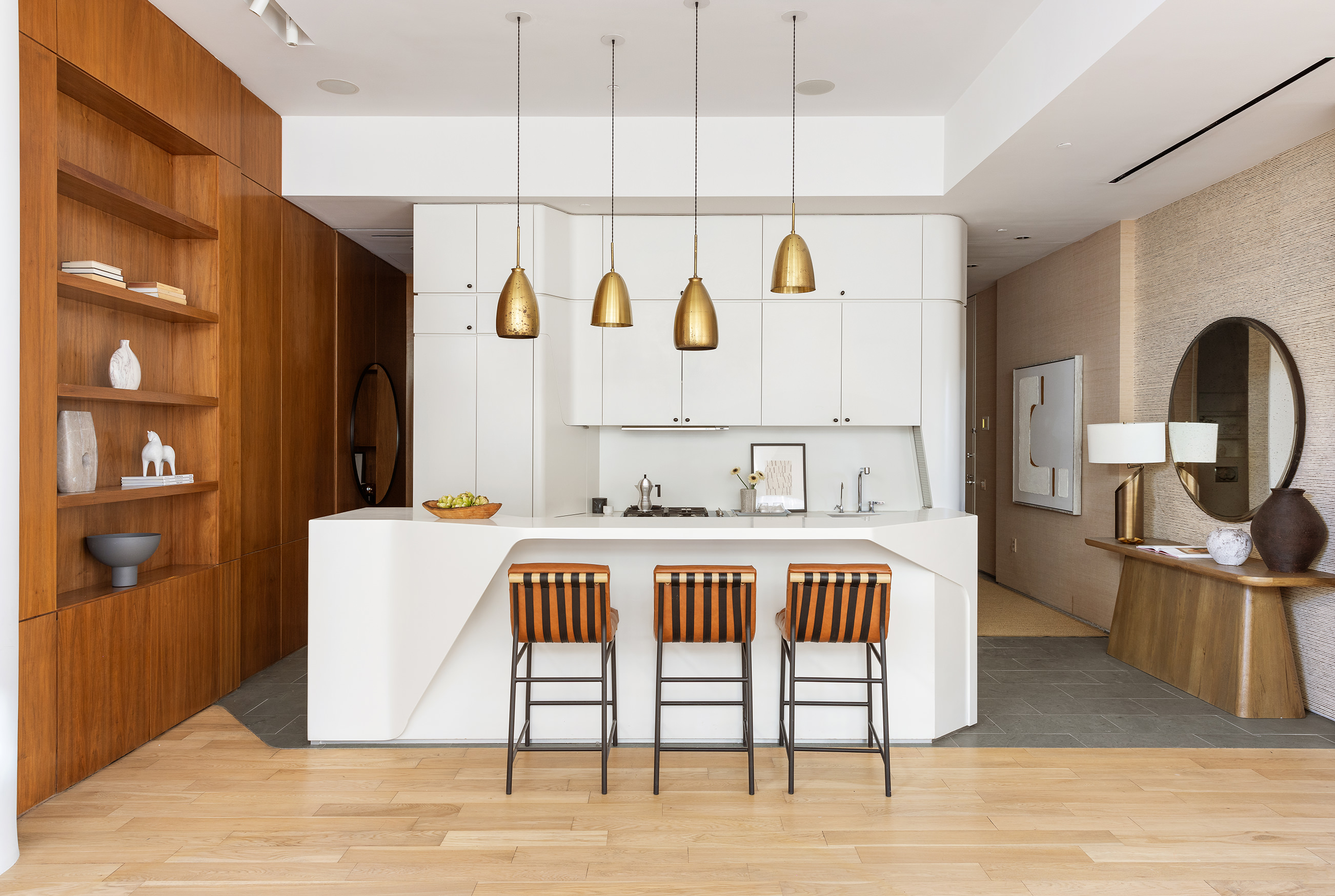 166 Perry Street, Unit 1C Manhattan, NY 10014 - Photo 5 of 18 a spacious bedroom with a bed a table and painting on the wall