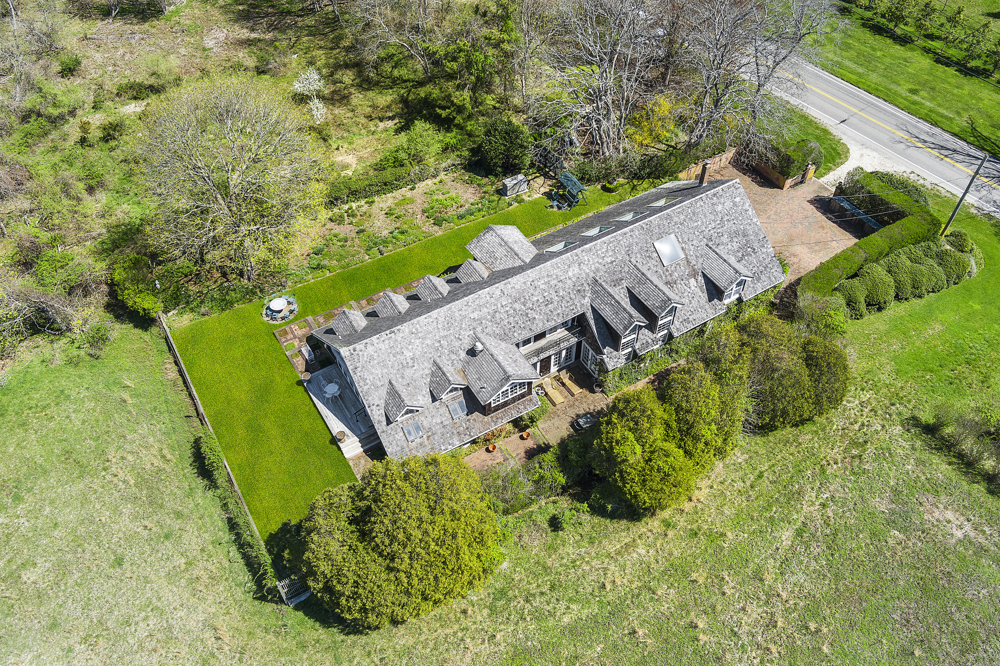 488 Ocean Road Bridgehampton, NY 11932 - Photo 21 of 21 view of a garden with an outdoor seating