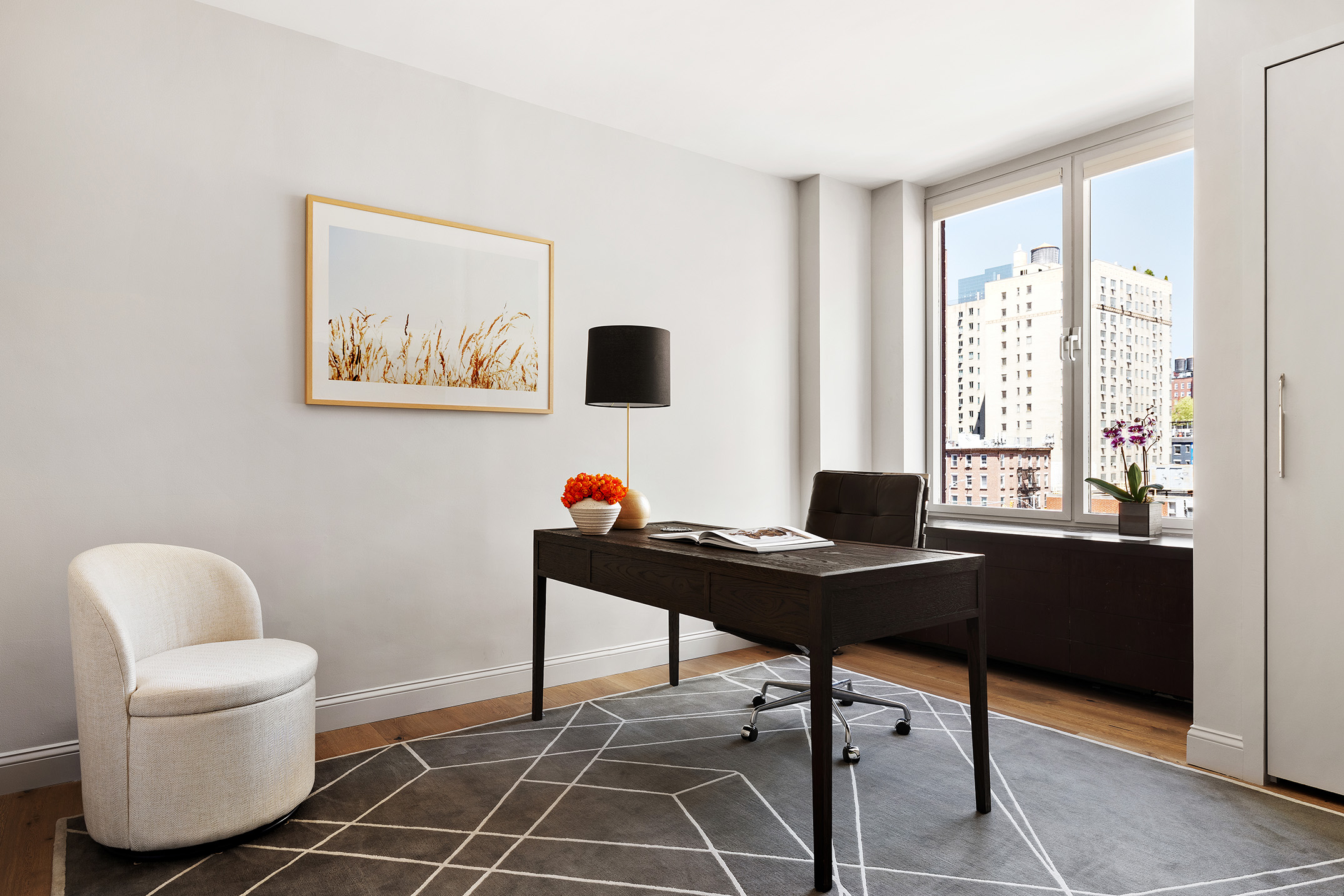 151 West 17th Street, Unit 4G Manhattan, NY 10011 - Photo 11 of 14 a work room with furniture and a window